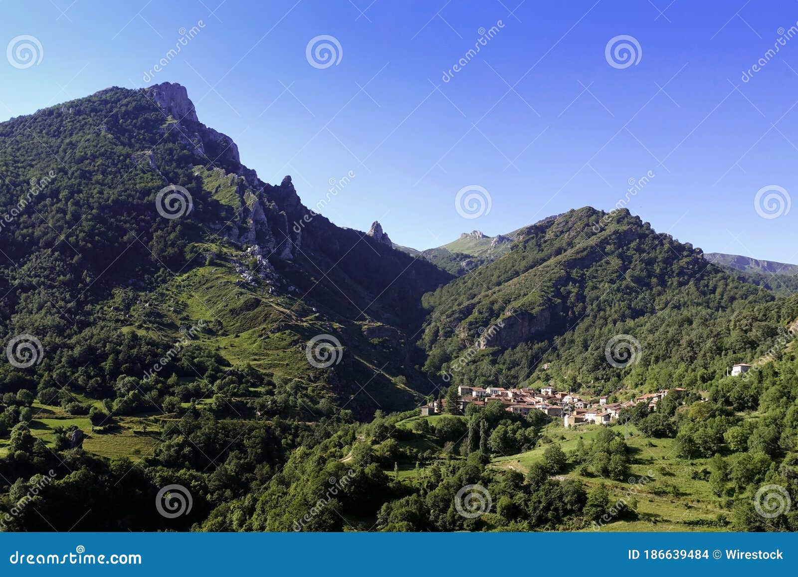 view of a mountain village under a clear blue sky in cucayo, liebana, cantabria, spain