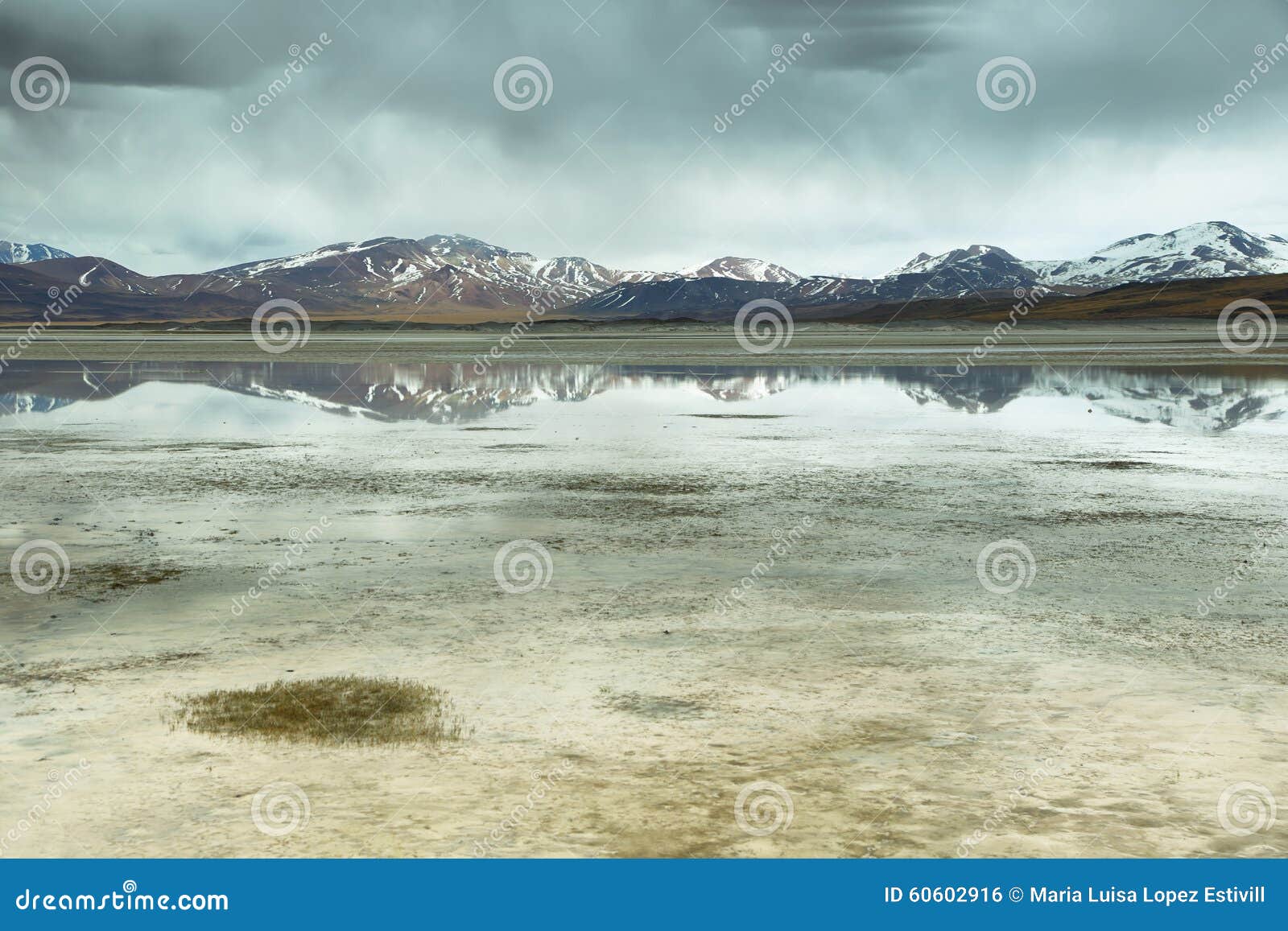 view of mountains and aguas calientes or piedras rojas salt lake in sico pass