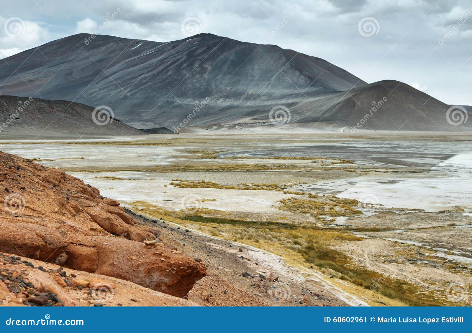 view of mountains and aguas calientes or piedras rojas salt lake in sico pass