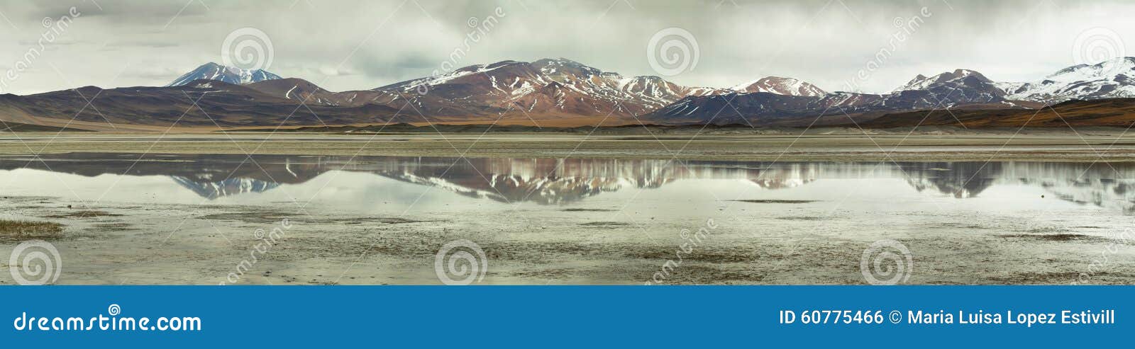 view of mountains and aguas calientes or piedras rojas salt lake in sico pass