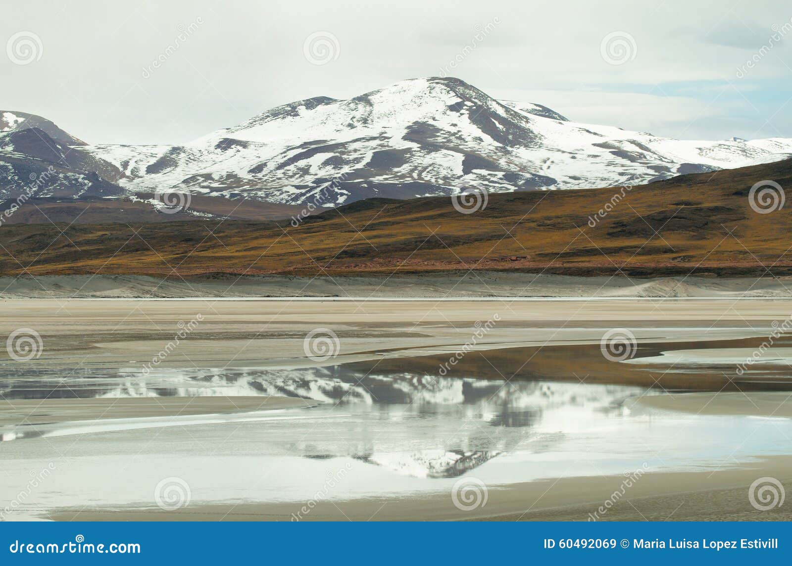 view of mountains and aguas calientes salt lake in sico pass