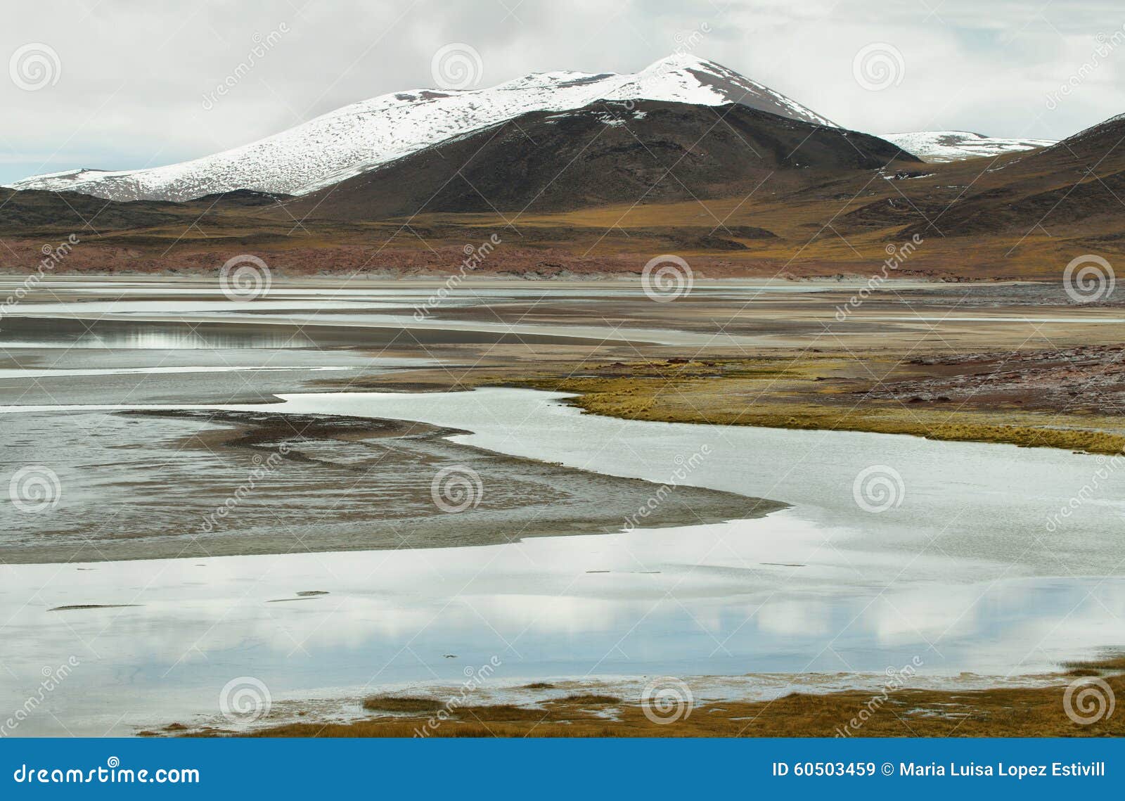 view of mountains and aguas calientes salt lake in sico pass