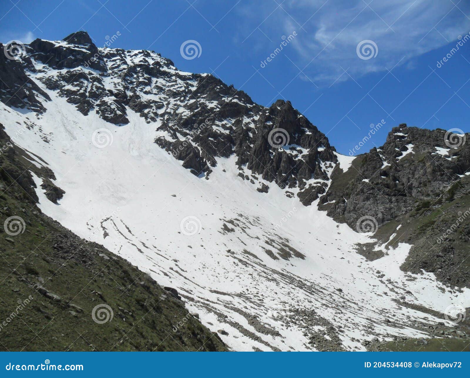 view of mountains covered with snow