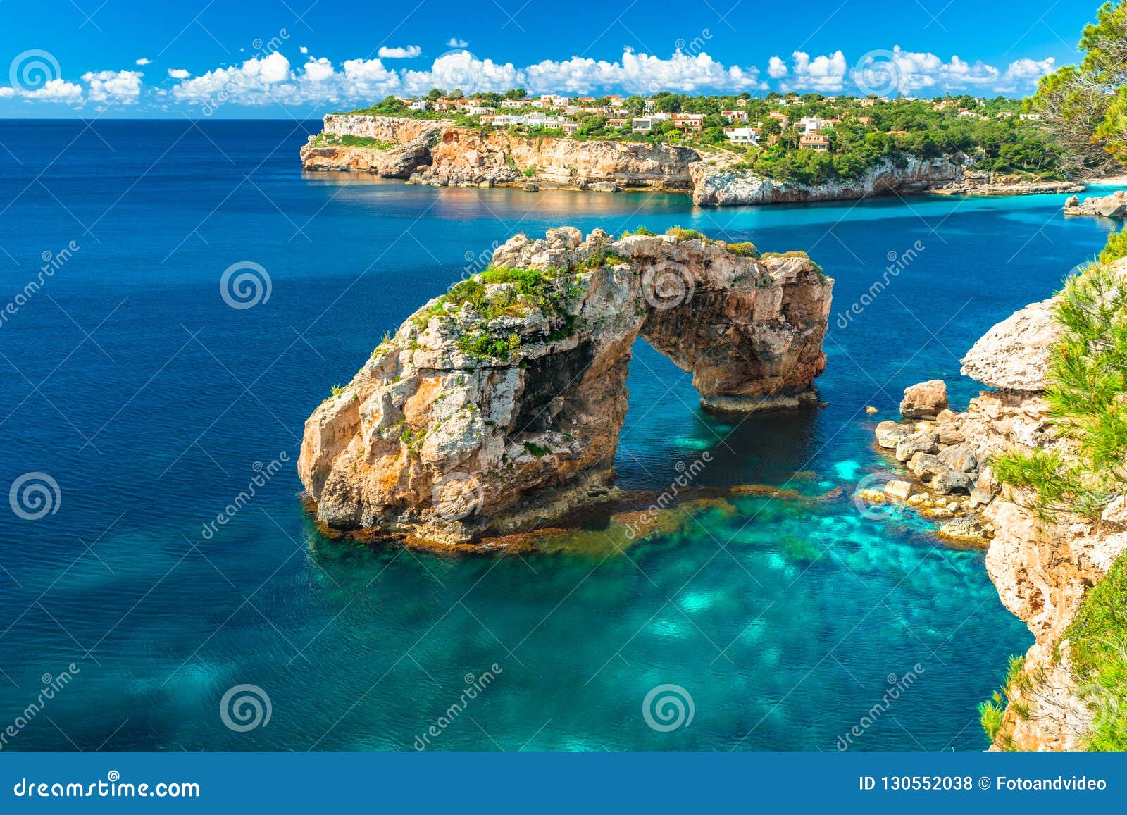 natural rock arch es pontas on majorca island, spain
