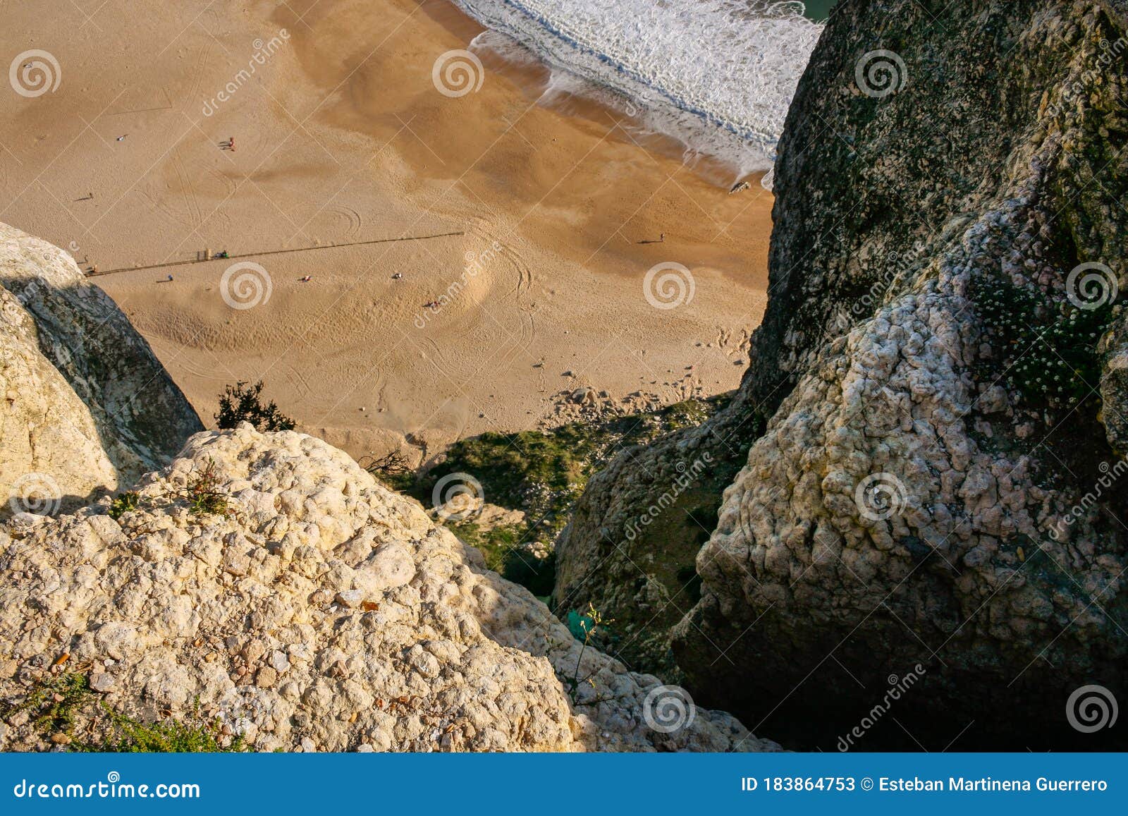 view of nazare beach from the viewpoint at the top of the cliff in o sitio