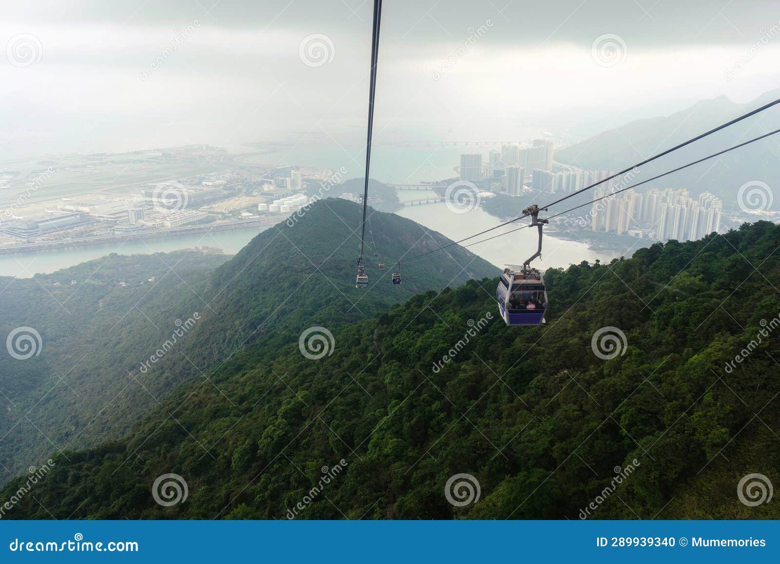 view from nhong ping 360 cable car crossing over the mountain in tung chung and lantau island