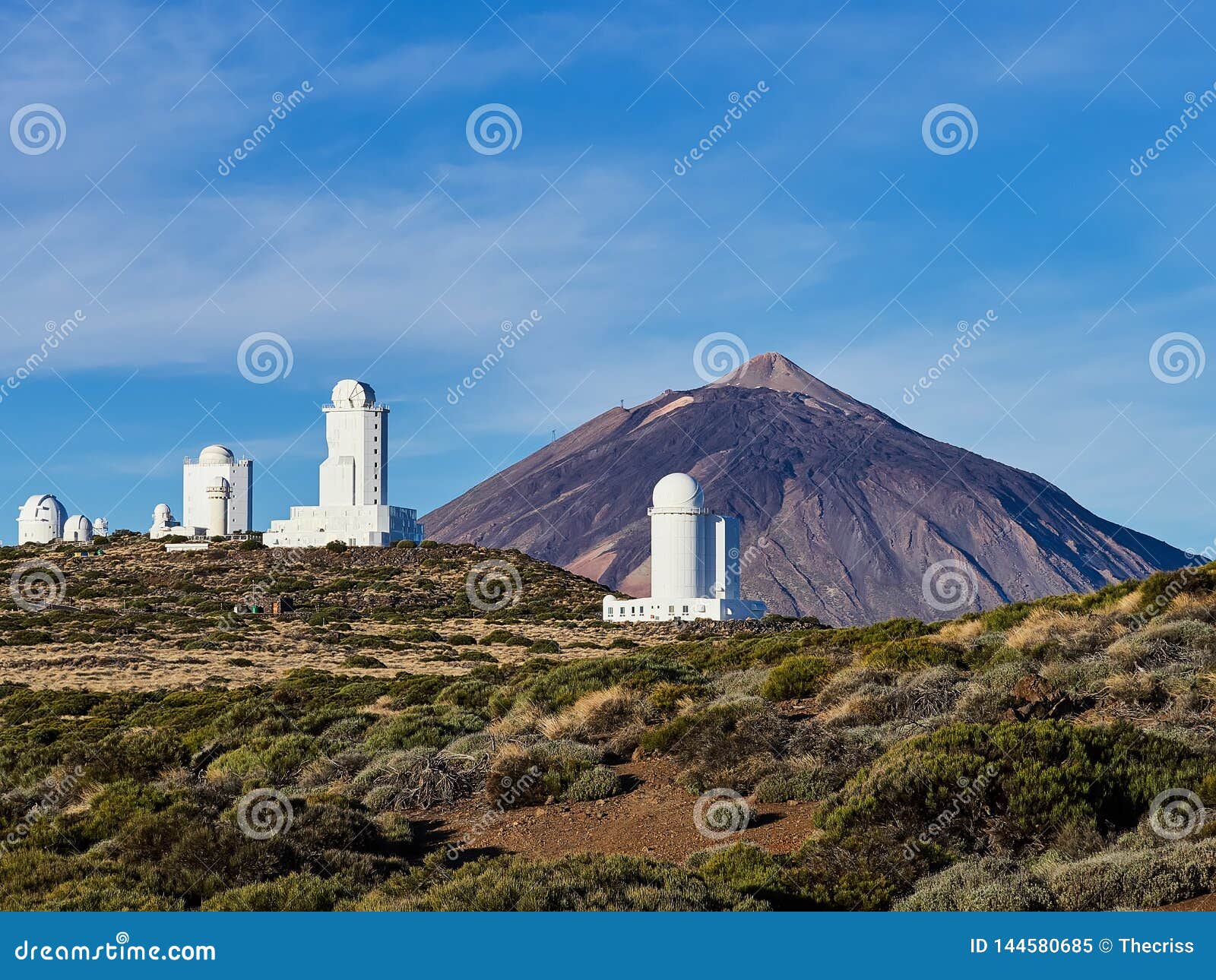 view of the observatory with mount teide to the rear observatorio del teide, tenerife, canary islands, spain