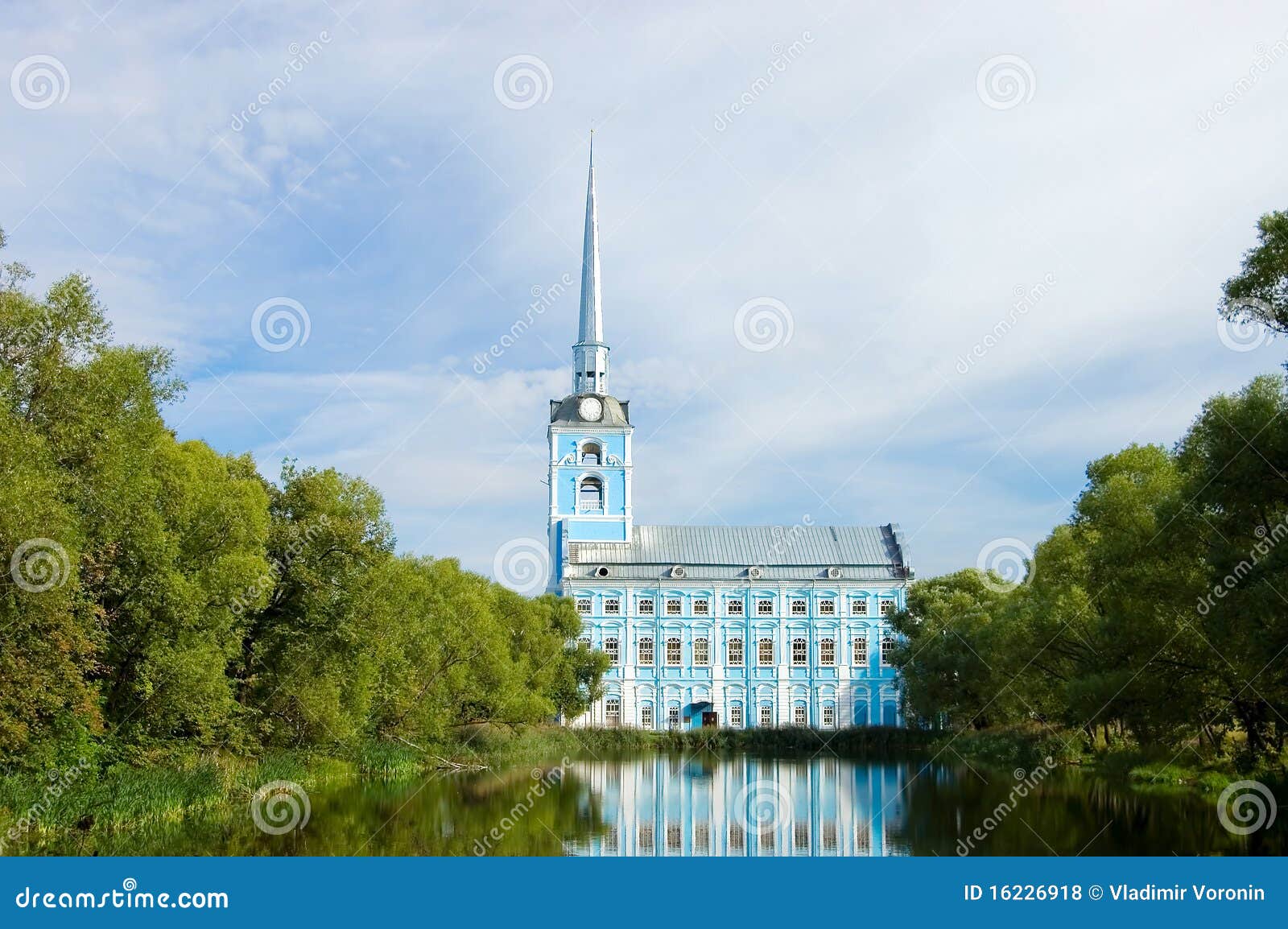 view of old church and reflexion in water