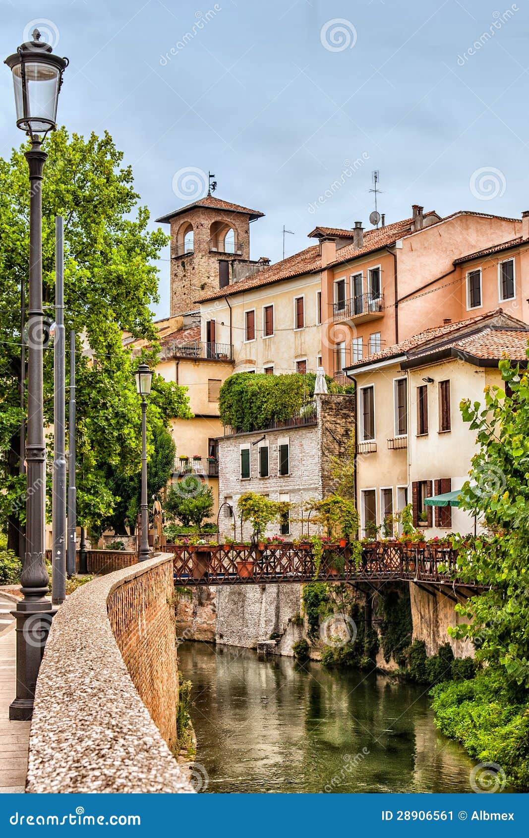 Pastel Houses and Bell Tower Overlooking Piovego Canal in Padua Italy with  Leafy Riverside Path Beneath Summer Sky Stock Image - Image of greenery,  veneto: 28906561, image size:1067x1690