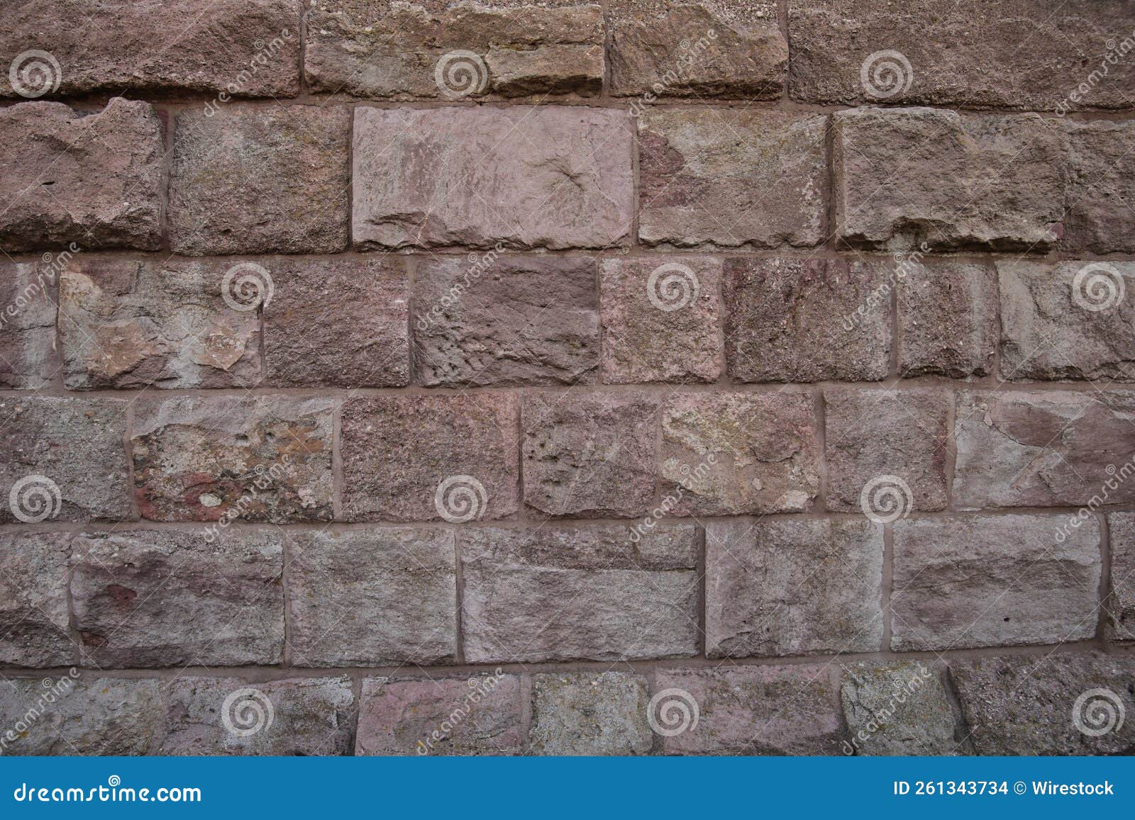 View of an Old Stone Wall Creates a Rough Background Stock Photo