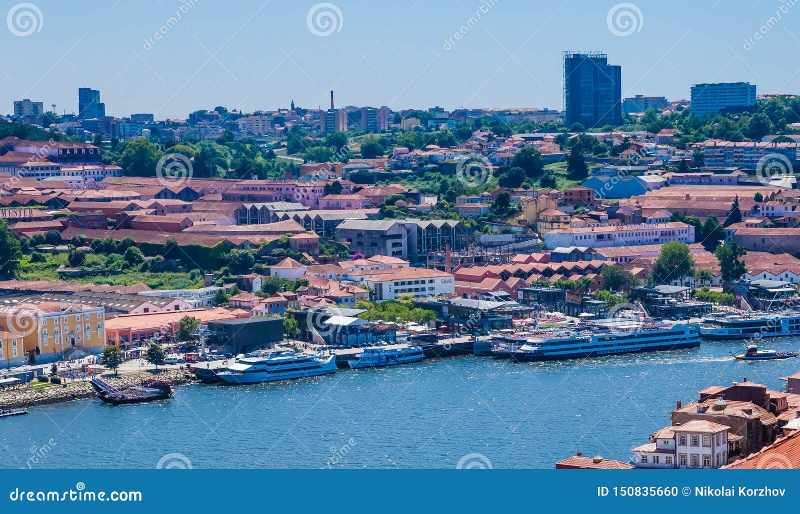 view of porto across river duoro towards vila nova de gaia, porto, portugal. vila nova de gaia is famed for housing