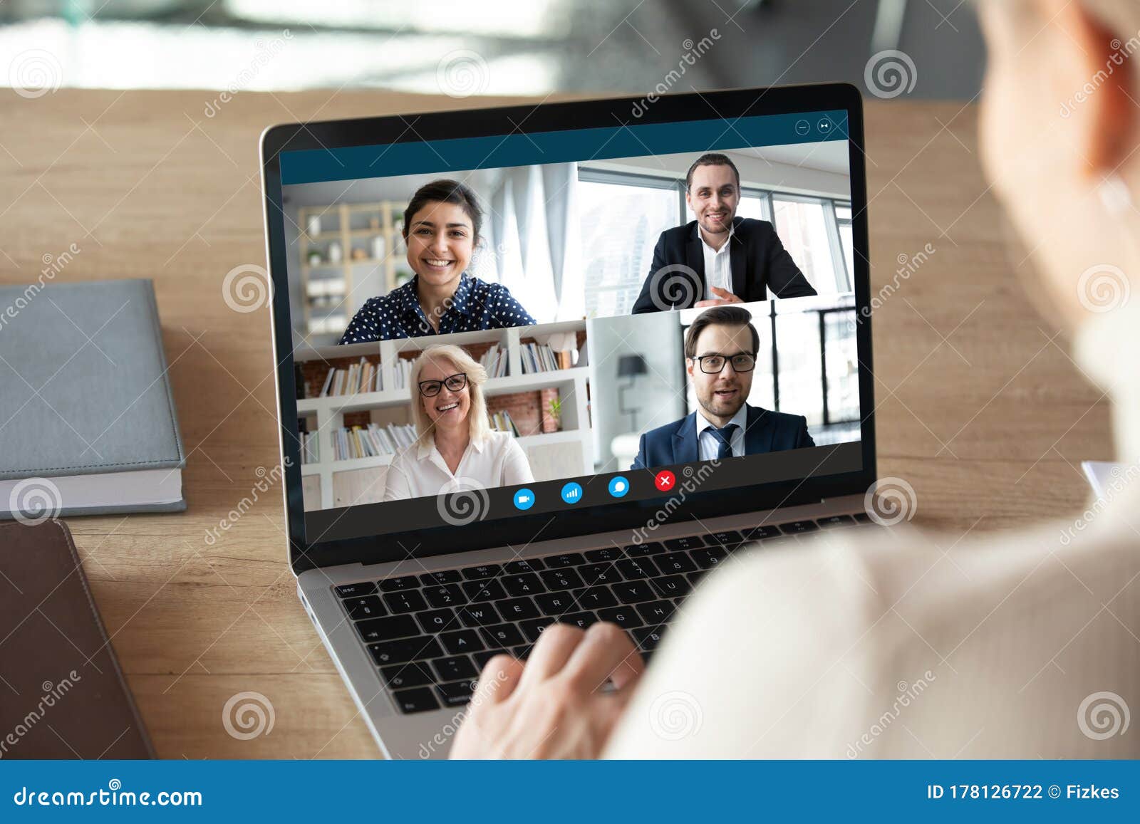 computer screen view diverse businesspeople negotiating distantly using videocall