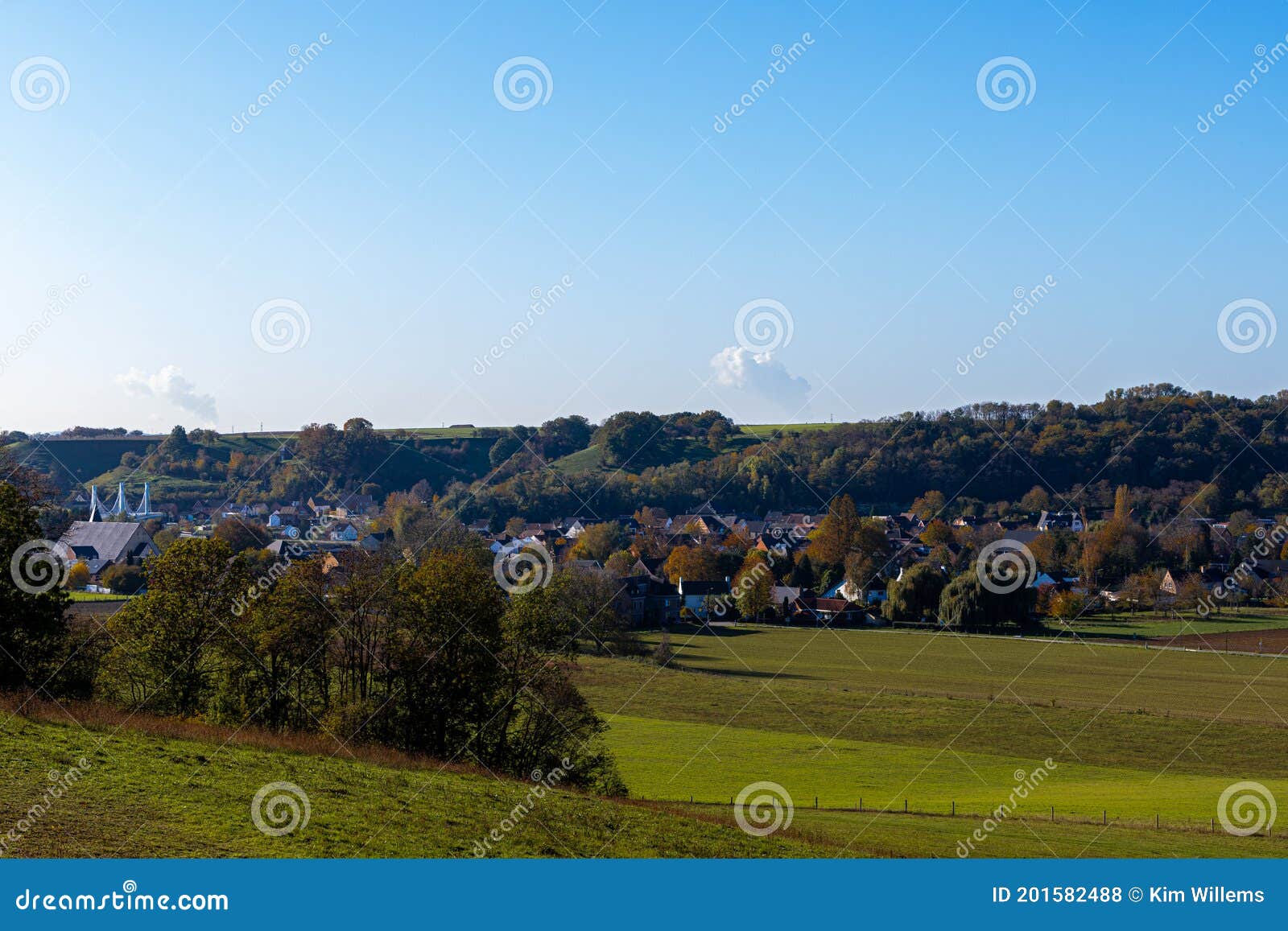 view over the jekervallei near maastricht with an amazing view over the nature turning into autumn with warm colors and the local