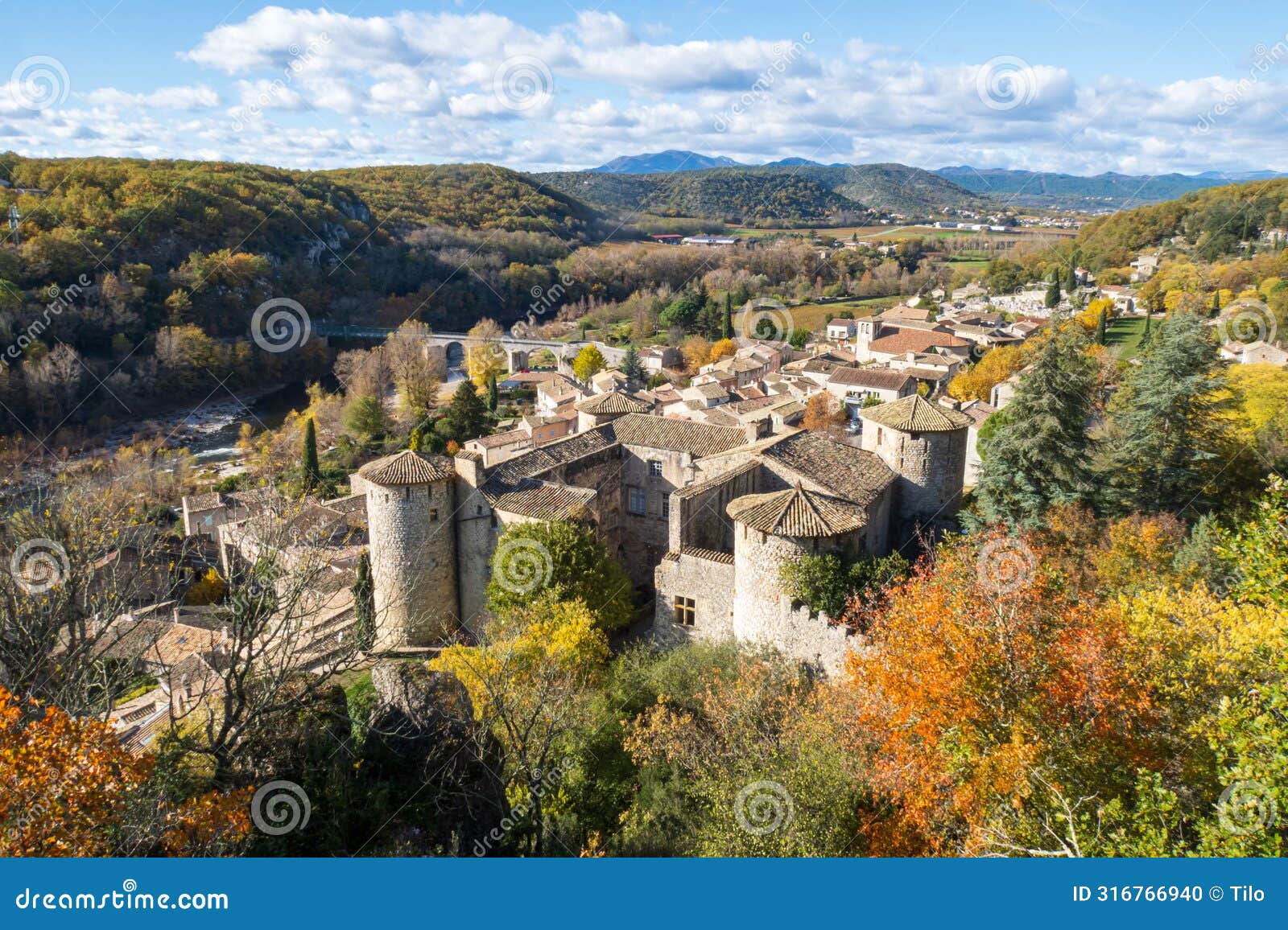 view over the roofs of the village of vogÃÂ¼ÃÂ©. photography taken in france