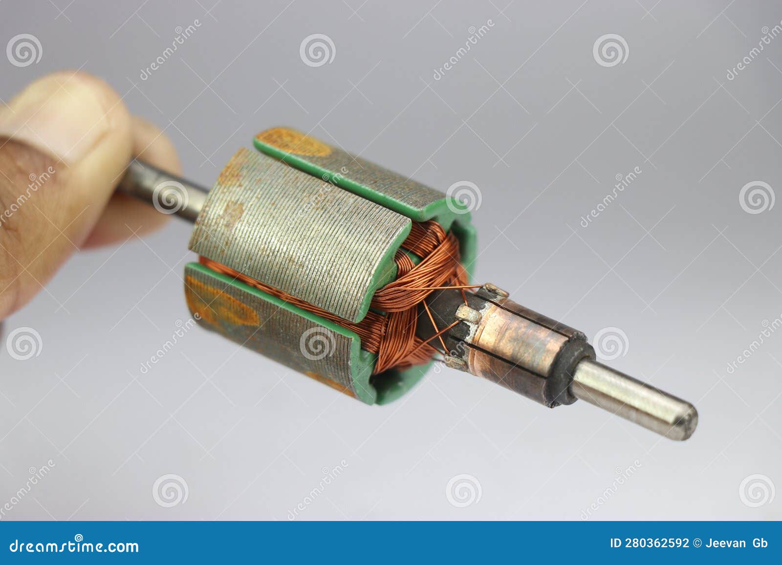 View of Part from Disassembled Electric Motor. DC Motor Rotor Held in
