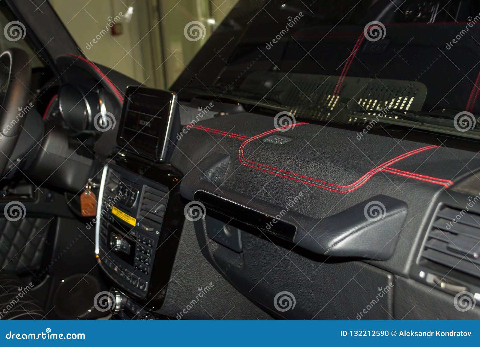 A View Of A Part Of The Interior Of The Car Dashboard From