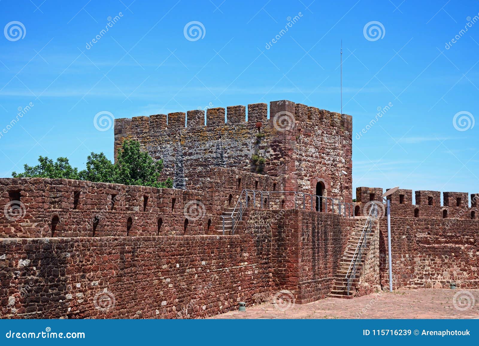 castle battlements and tower, silves, portugal.