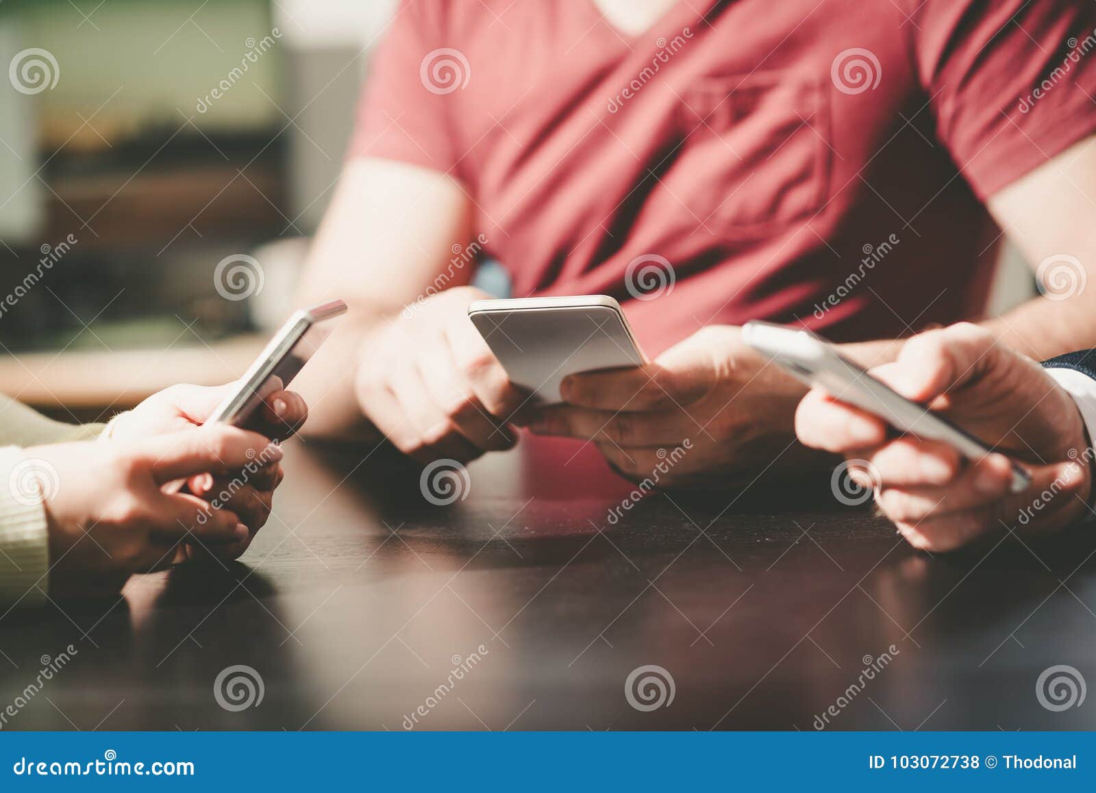 people hands using mobile phones