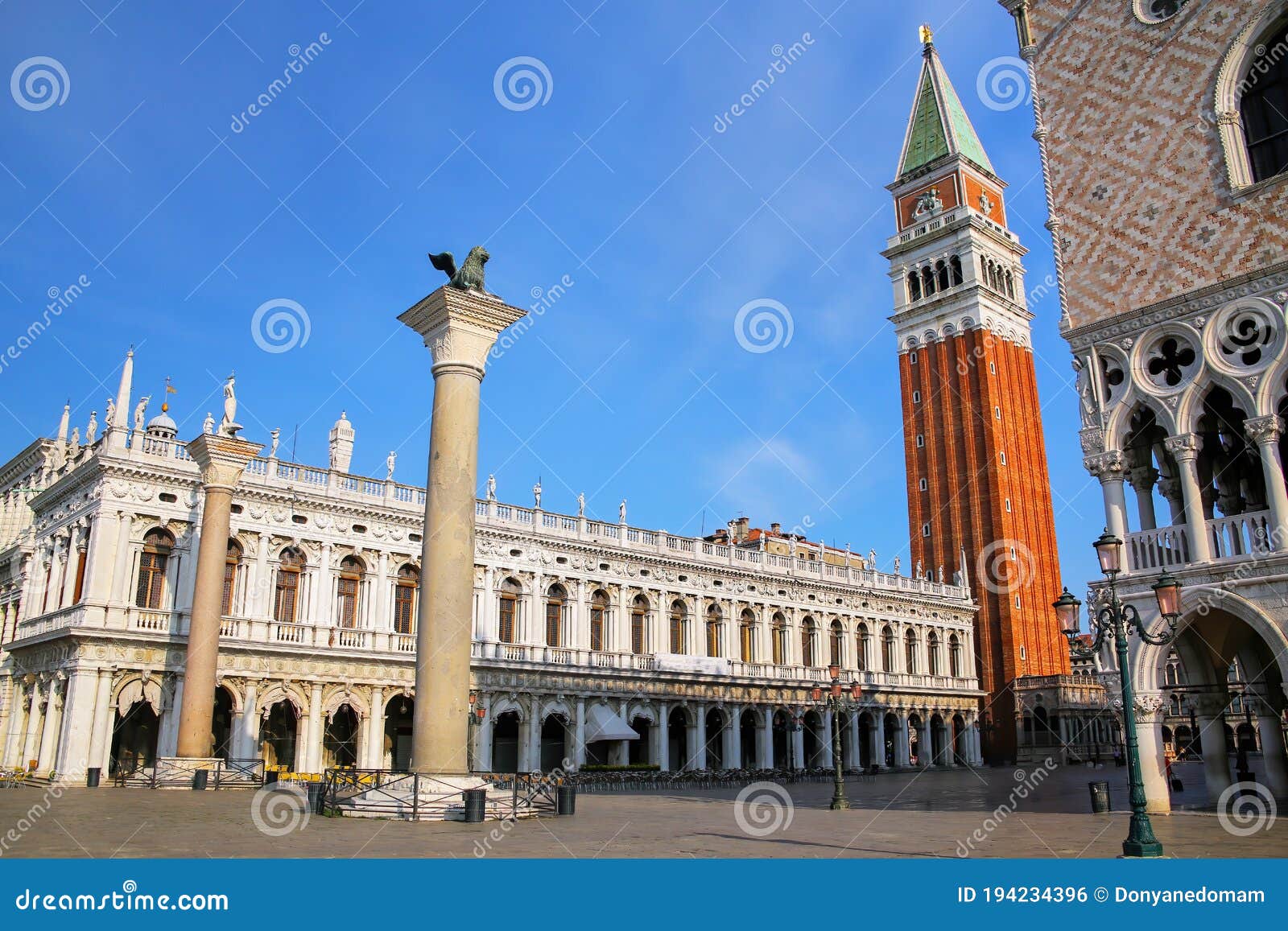 view of piazzetta san marco with st mark`s campanile, lion of venice statue, biblioteca and palazzo ducale in venice, italy