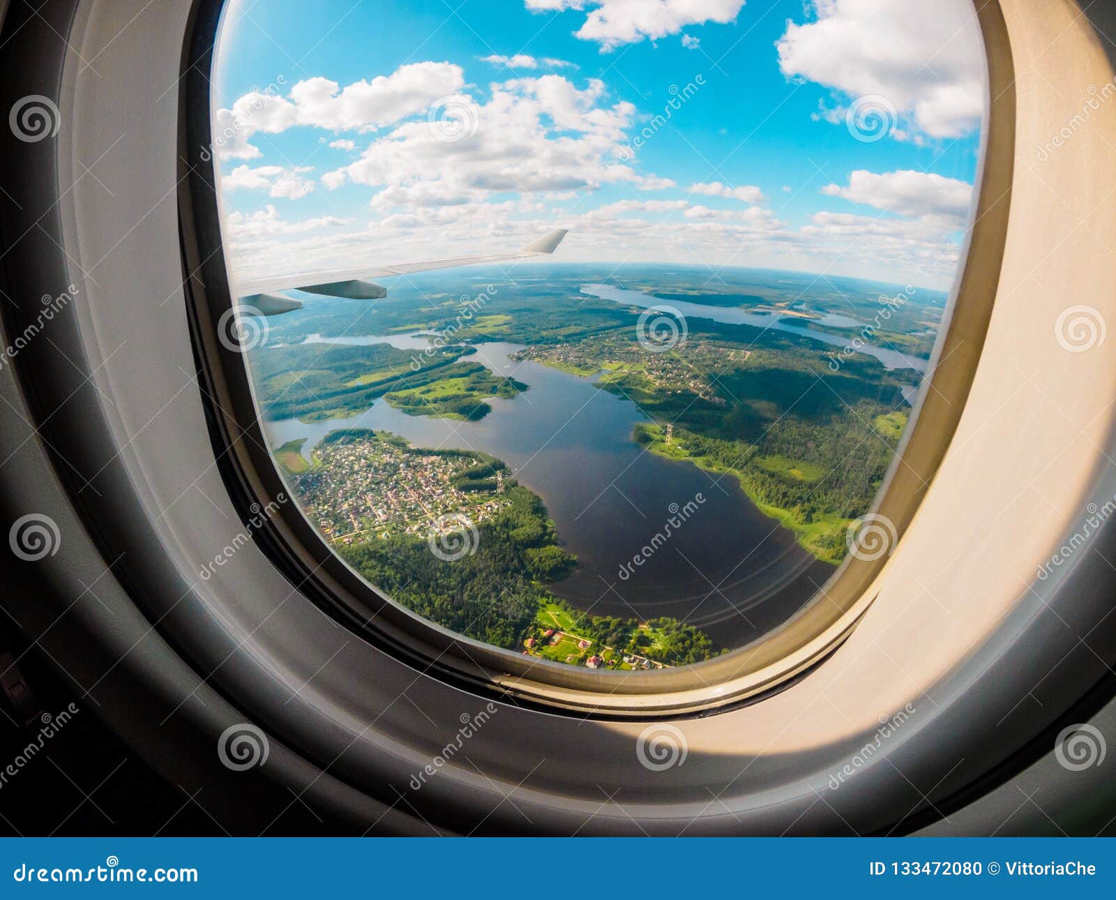 view of the planet earth through the airplane porthole