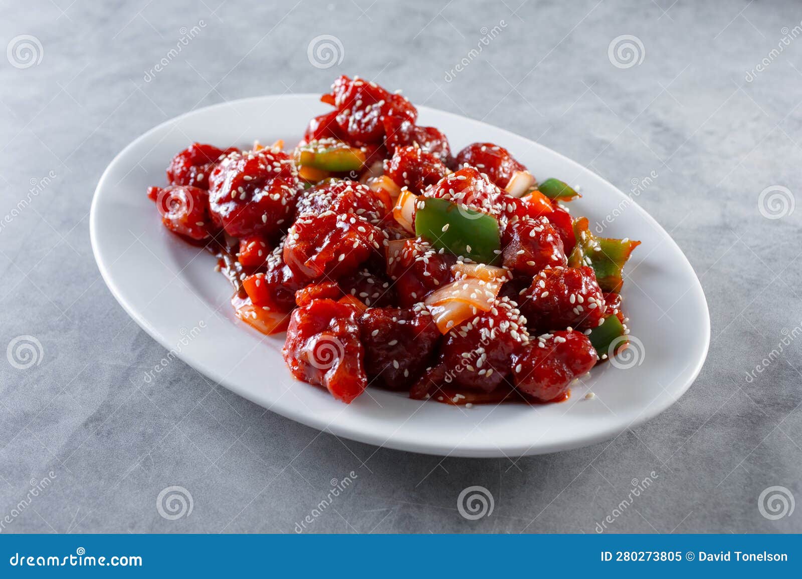 Plate of orange chicken stock image. Image of table 280273805