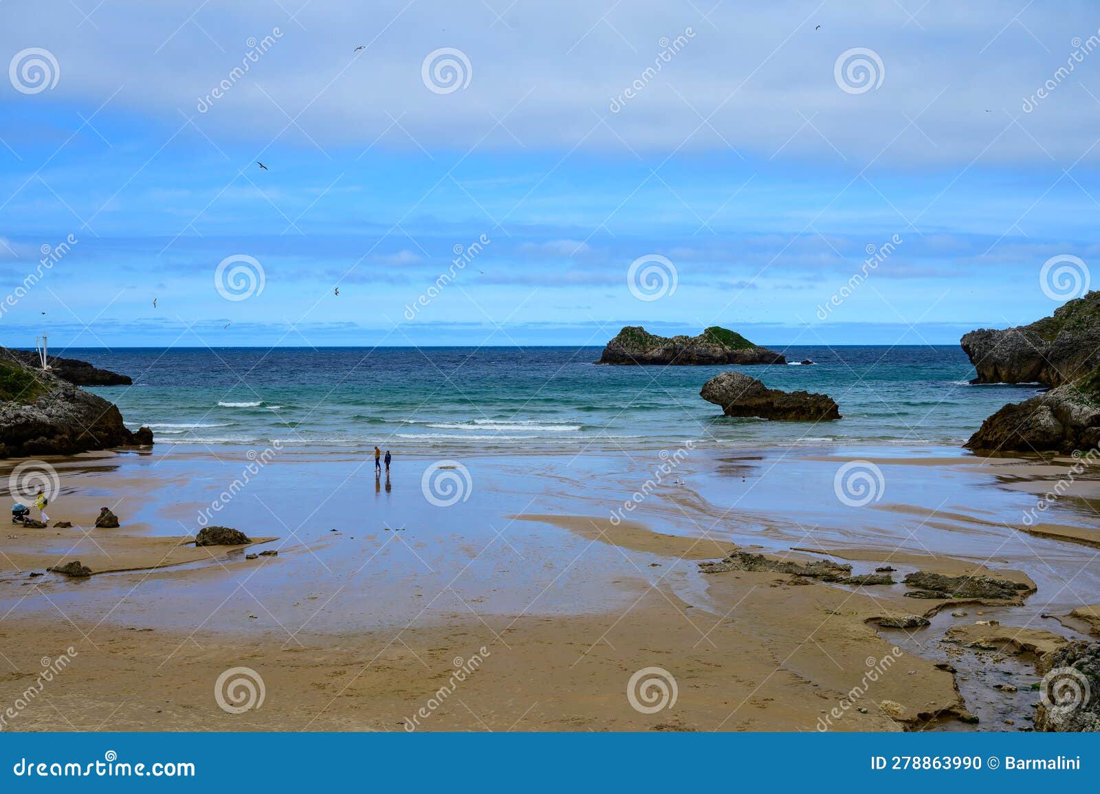 view on playa de palombina las camaras in celorio, green coast of asturias, north spain with sandy beaches, cliffs, hidden caves,