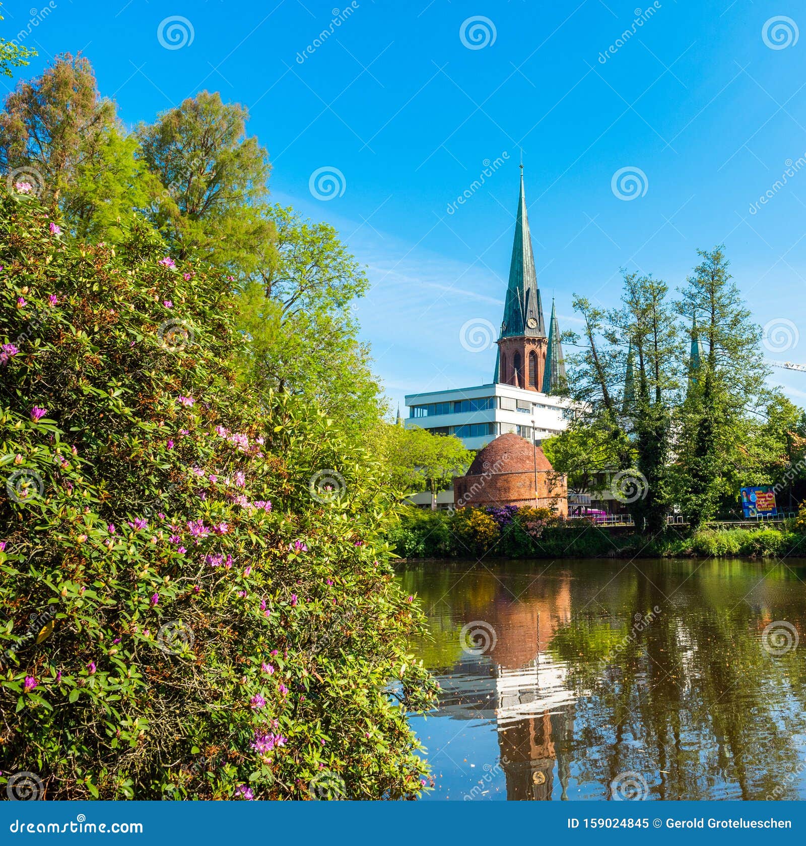 View of the Pond and St. Lamberti Church of Oldenburg, Germany