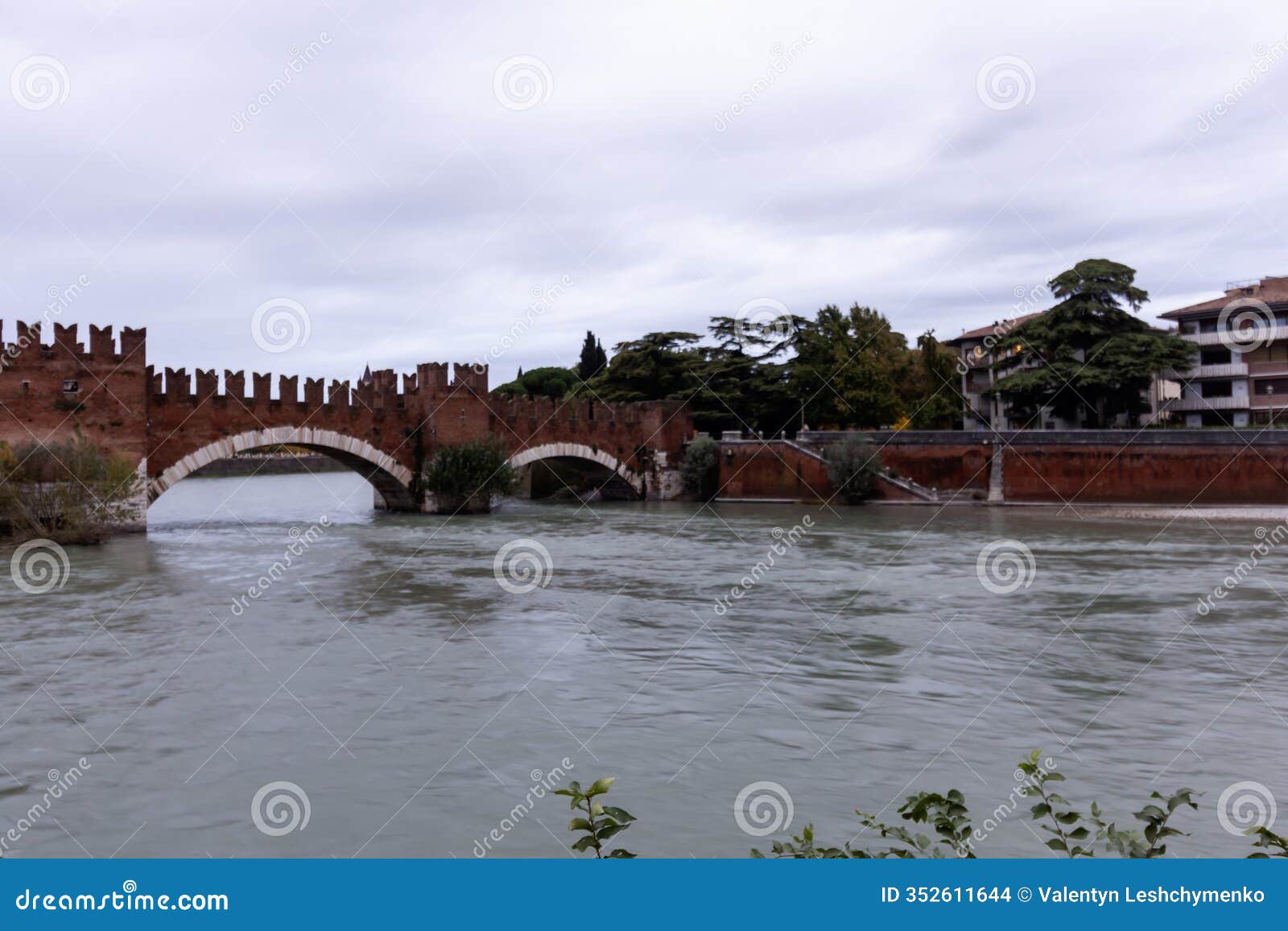 a view of the ponte di castelvecchio (castelvecchio bridge) in verona