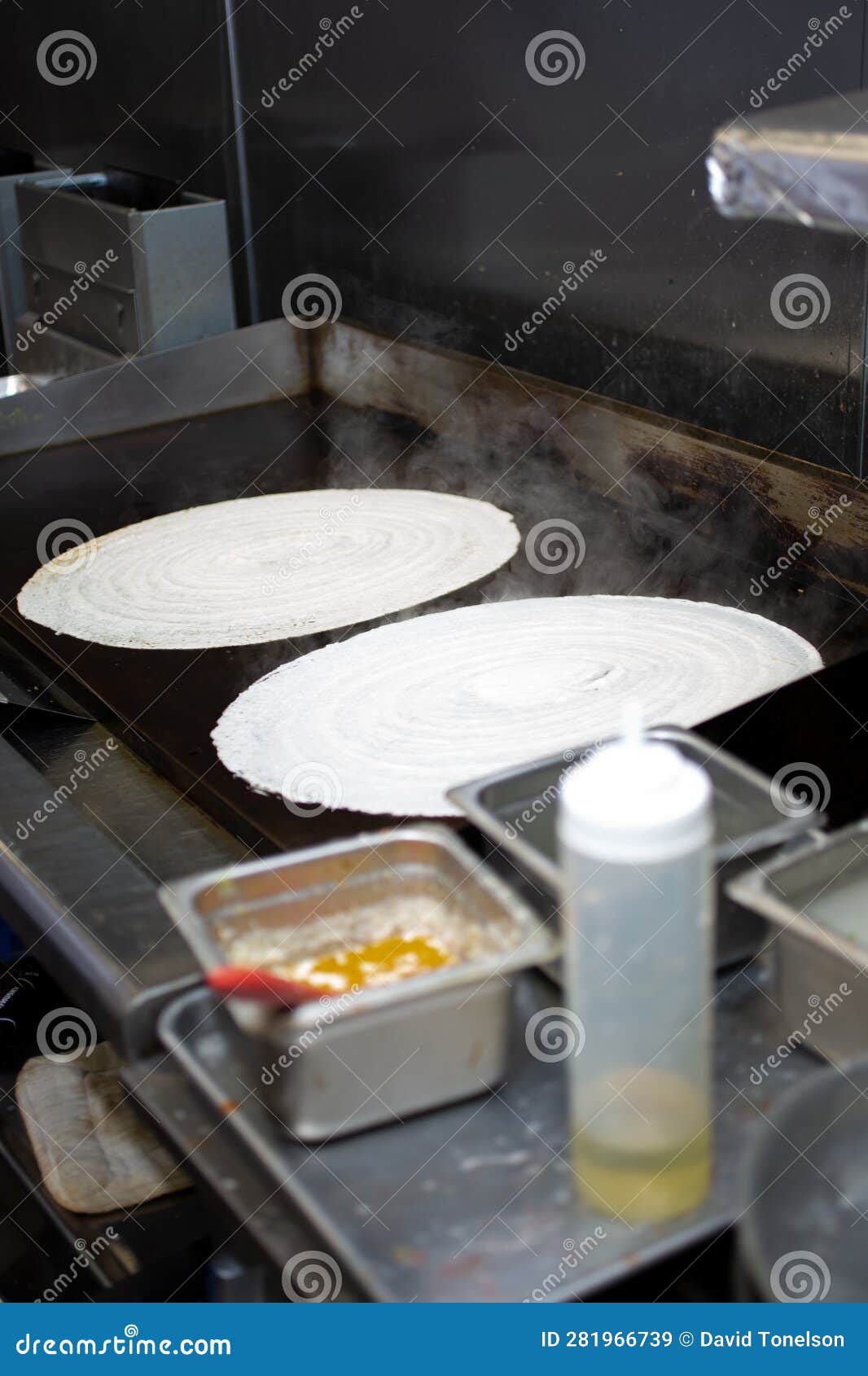 Making dosa on griddle stock image. Image of order, chef 281966739