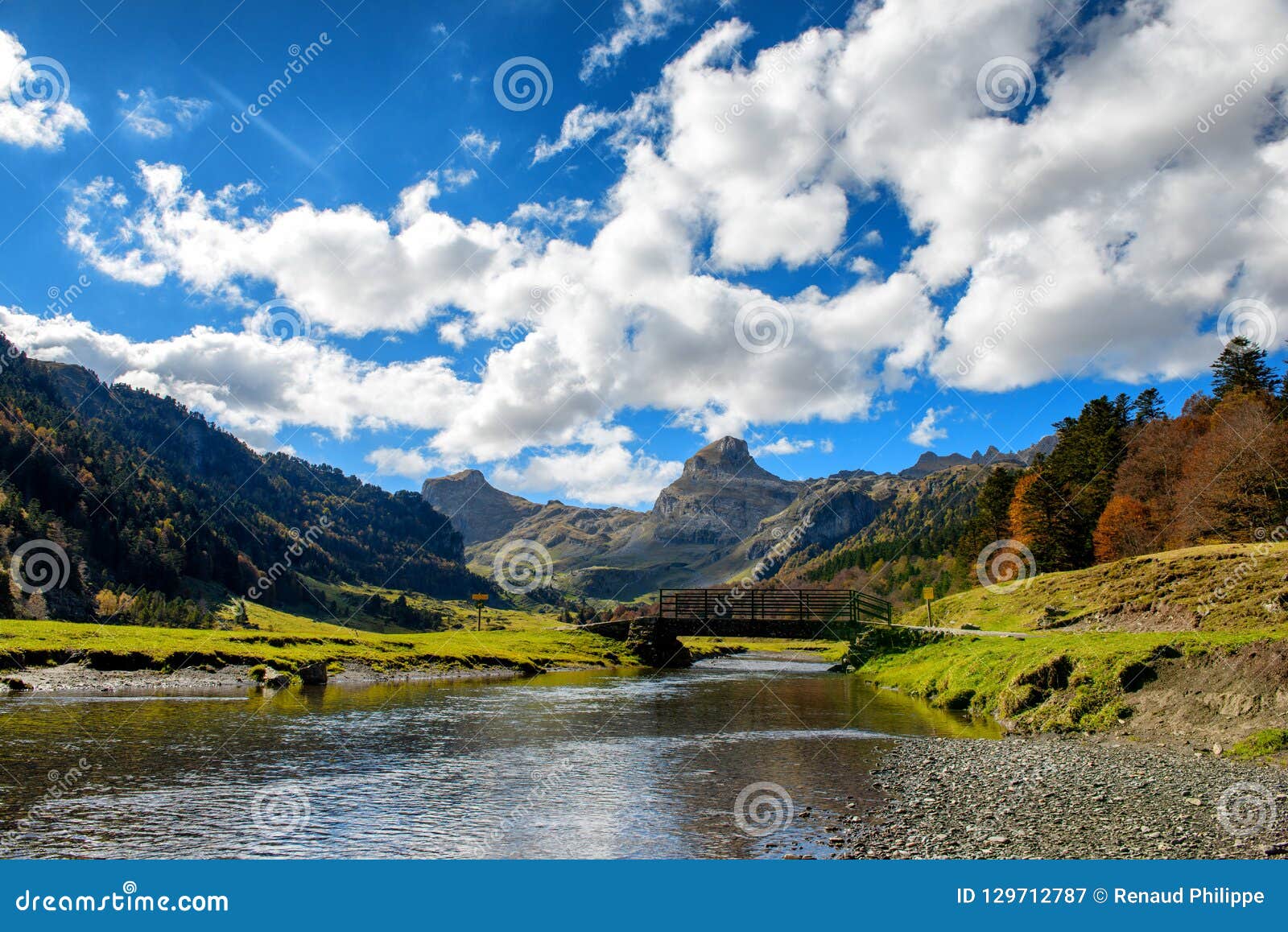 View of Pyrenees Mountains with Small River Near Pic Ossau Stock Image