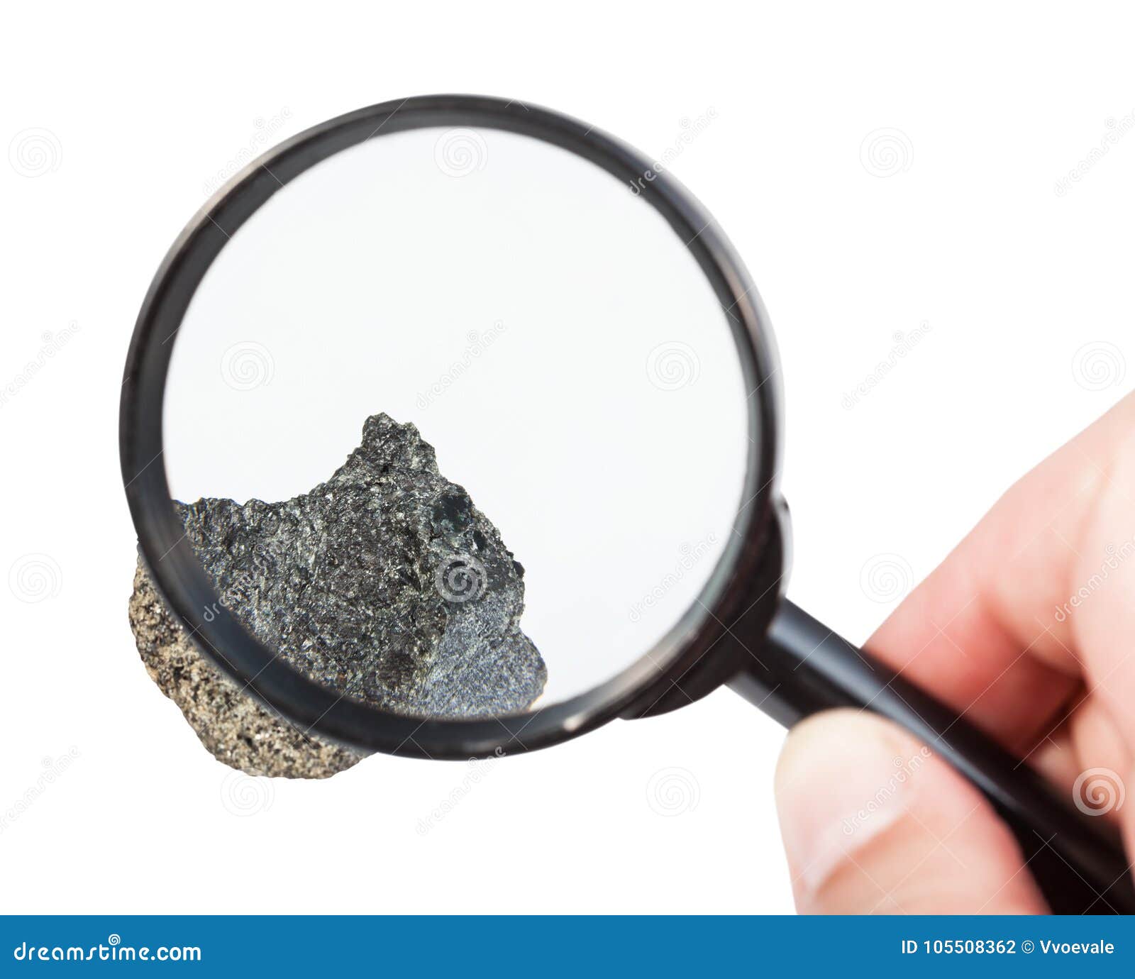 view of raw peridotite stone through magnifier