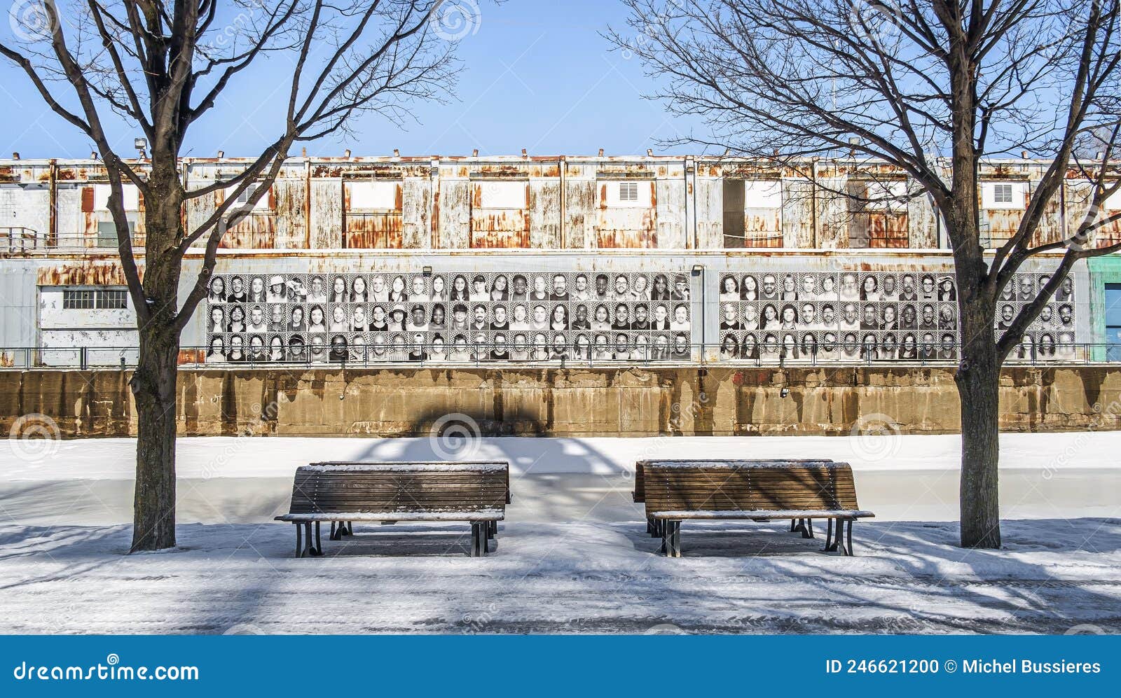 view of sheds covered whit photography in montreal old port in winter