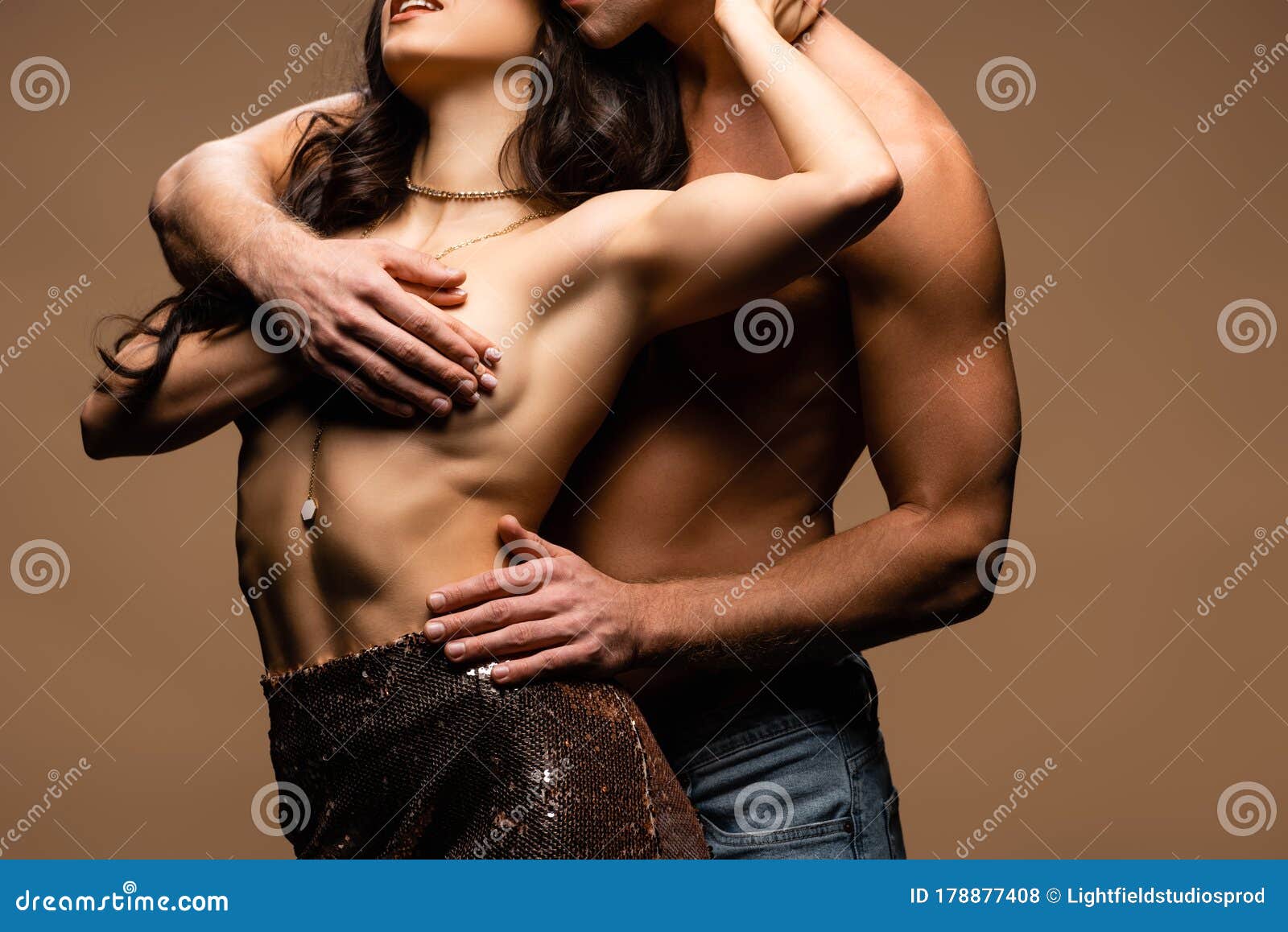 View of Shirtless Boyfriend Covering Breast of Seductive Half Naked  Girlfriend in Paillettes Skirt Isolated on Beige Stock Photo - Image of  girlfriend, friendship: 178877408
