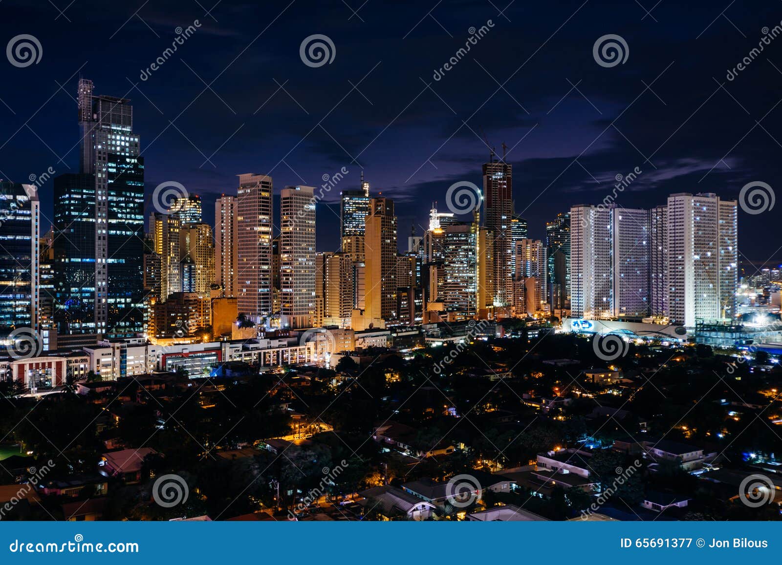 view of the skyline of makati at night, in metro manila, the phi