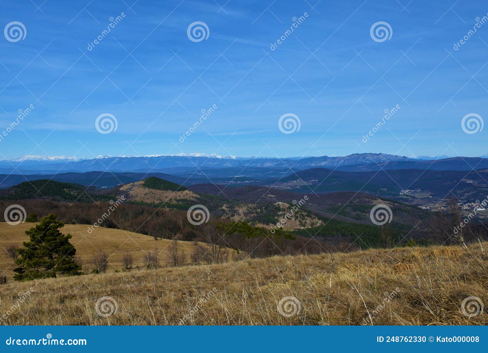 view of slovene littoral region with nanos and golaki mountains