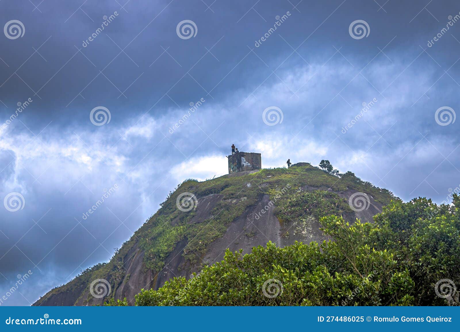 view of the small house seen on top of the mountain 