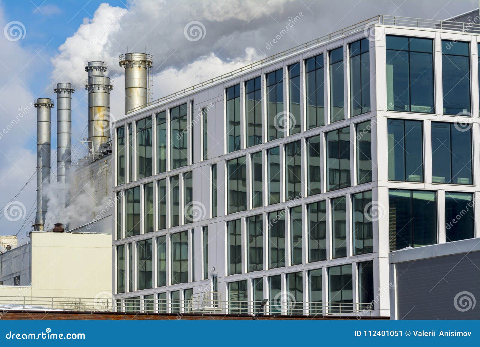 Smoking Factory Pipes and Office Building of the Factory Stock Image