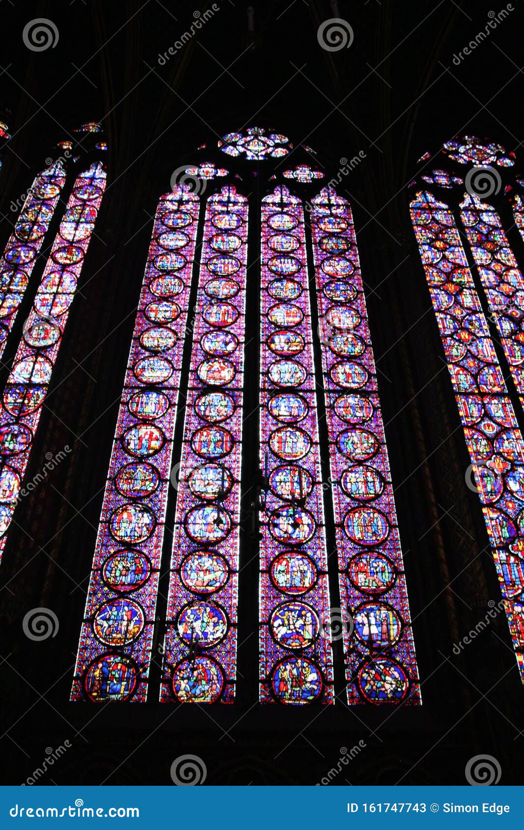 A View of the Stained Glass Windows in Saint Chappell in Paris