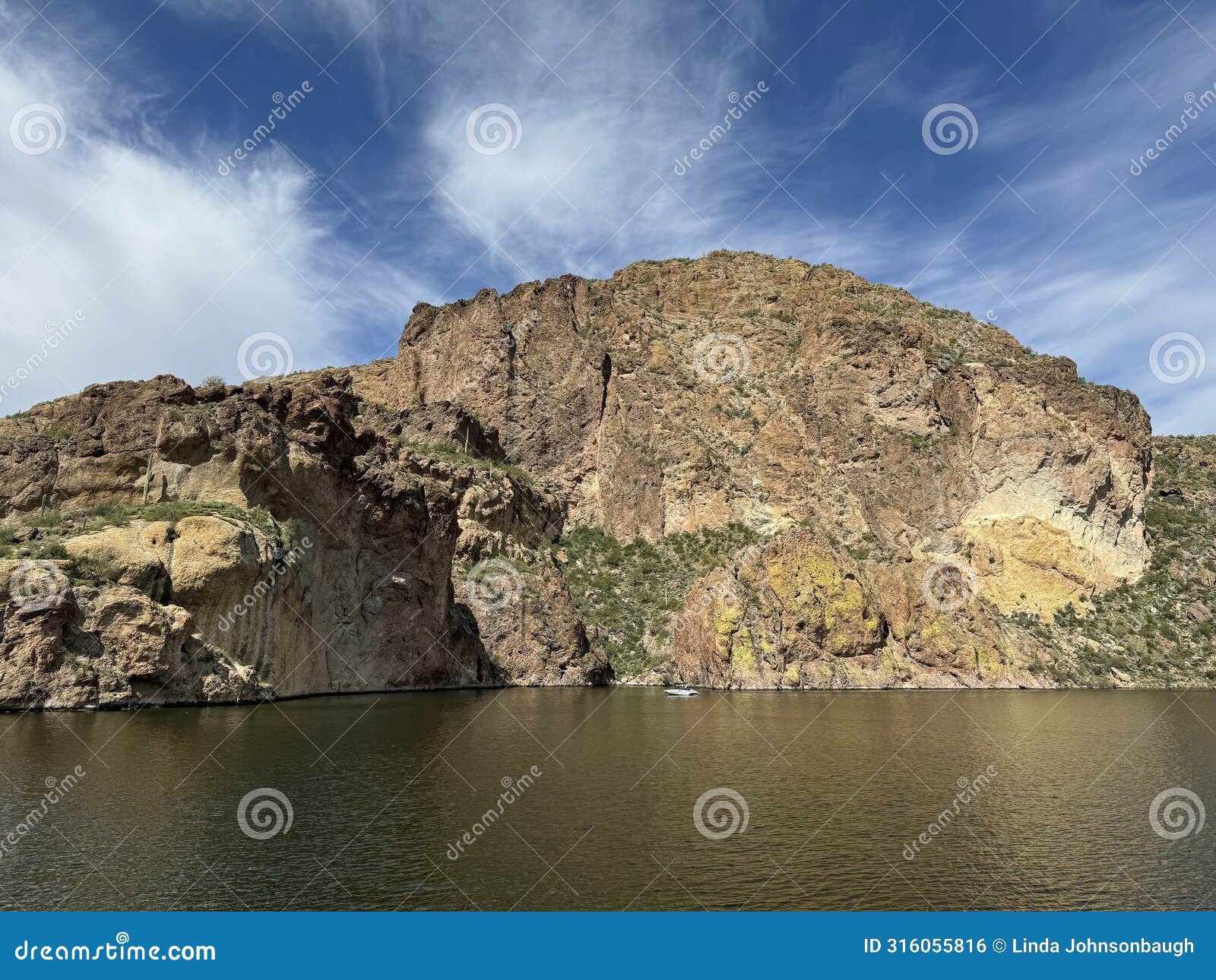 view of canyon lake and rock formations from a steamboat in arizona