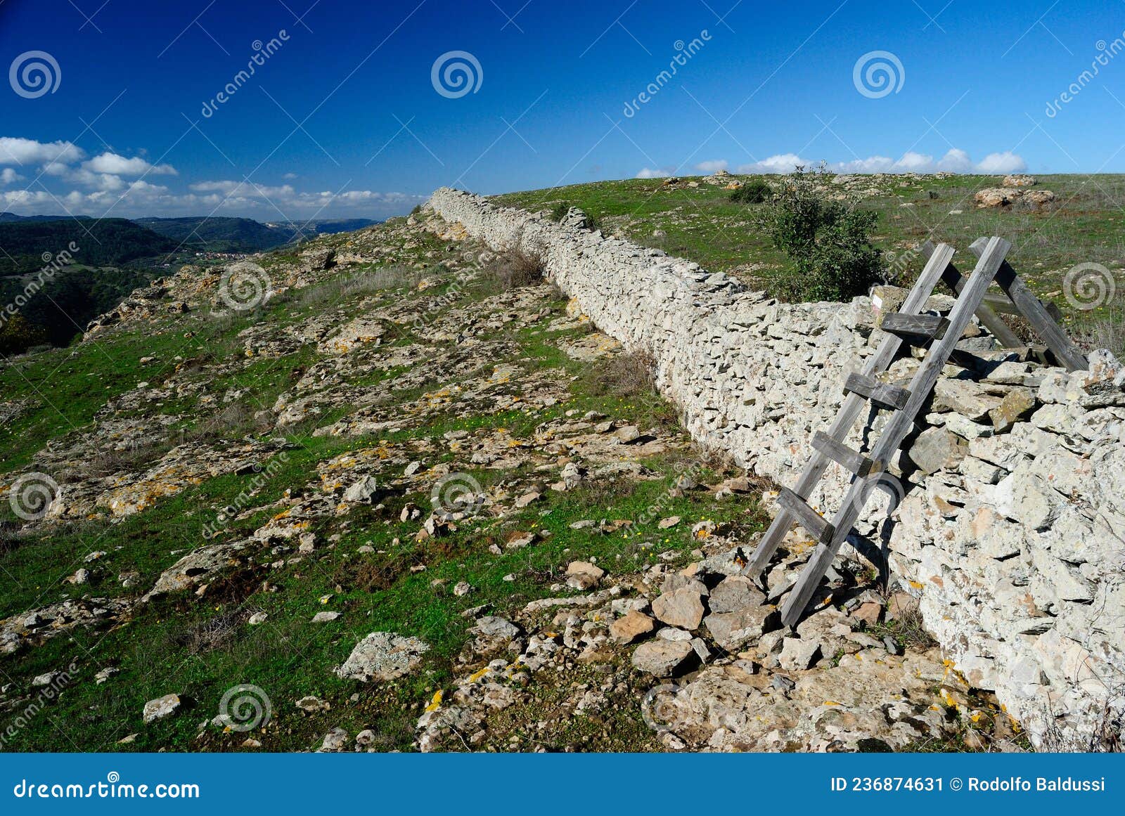 view of stone fence at monte pelao