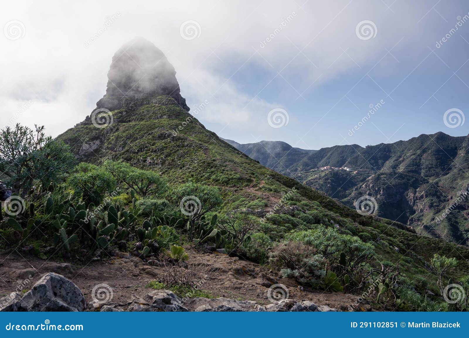view of the taborno mountain in the clouds in national park anaga, tenerife, canary islands, spain.