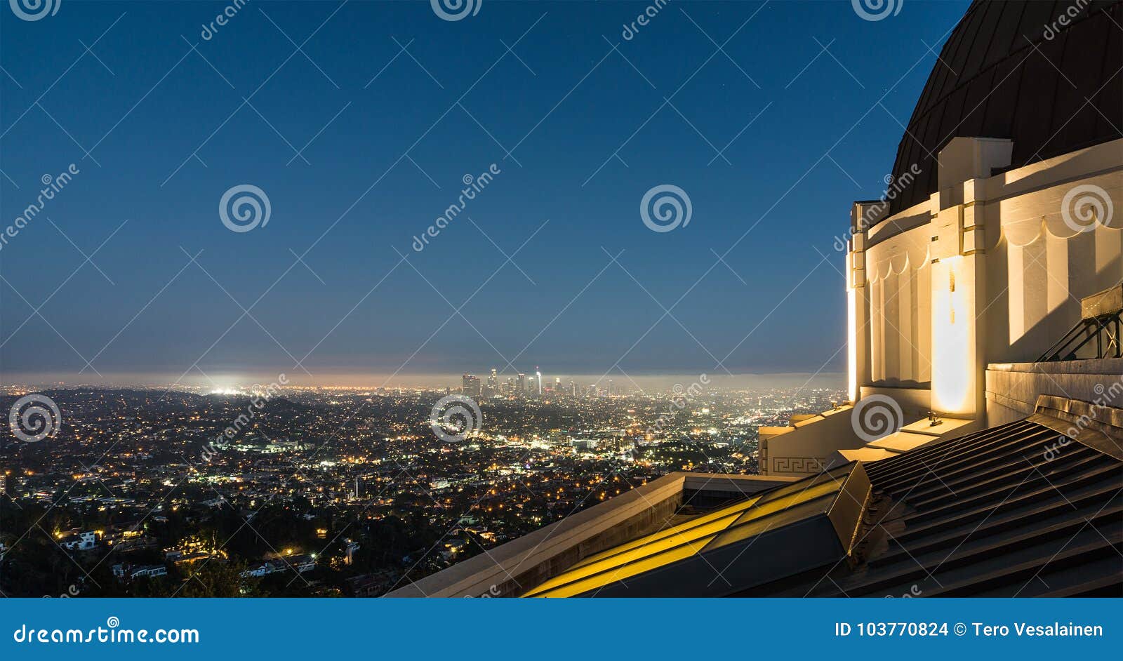 view to los angeles downtown at night from griffith observatory.