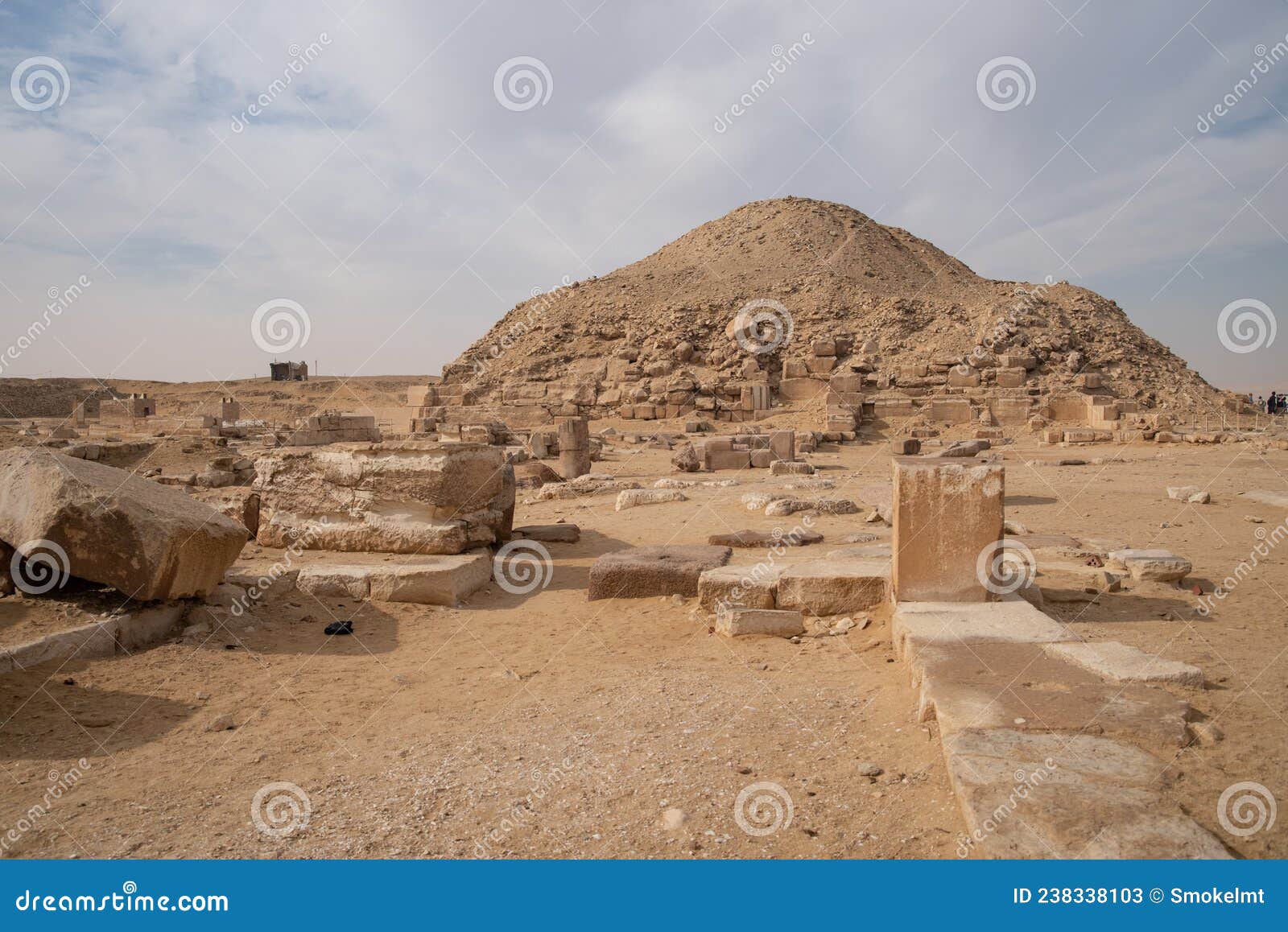 view to pyramid of unas from archeological remain in the saqqara necropolis, egypt