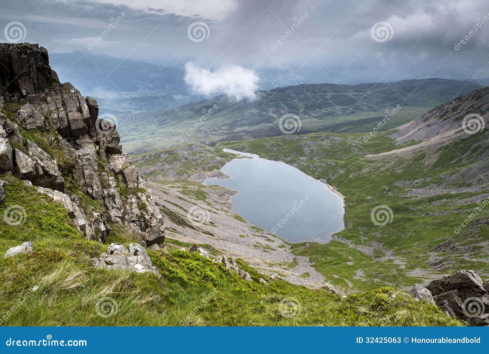 view from top of cadair idris looking to llyn y gader landscape