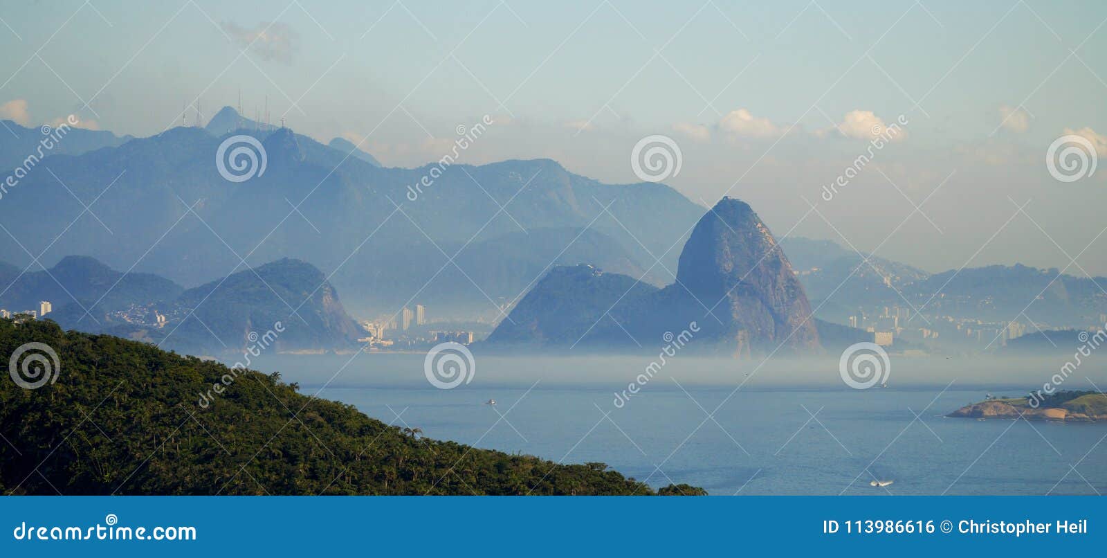 the view towards rio de janeiro and sugar loaf mountain from itacoatiara in niteroi, brazil.