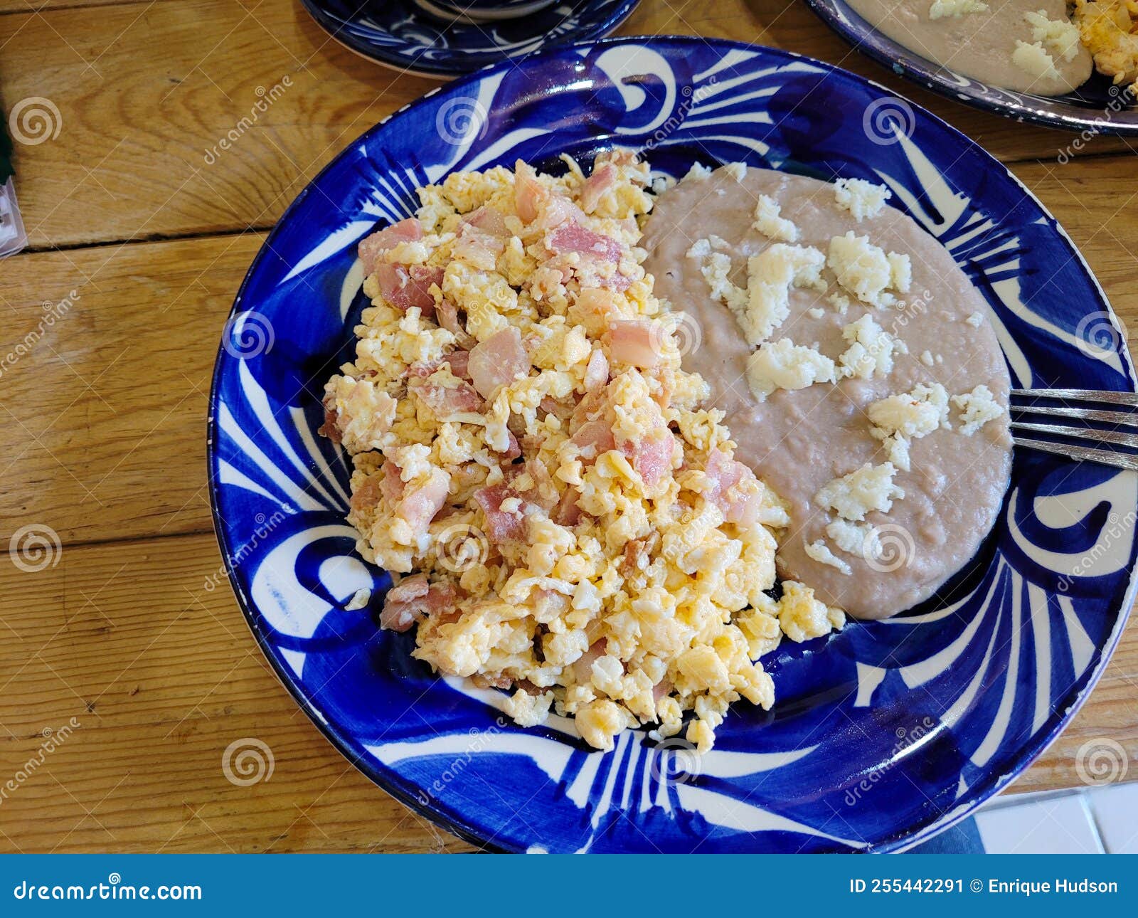 View on a Traditional Plate of Egg and Ham by Beans with