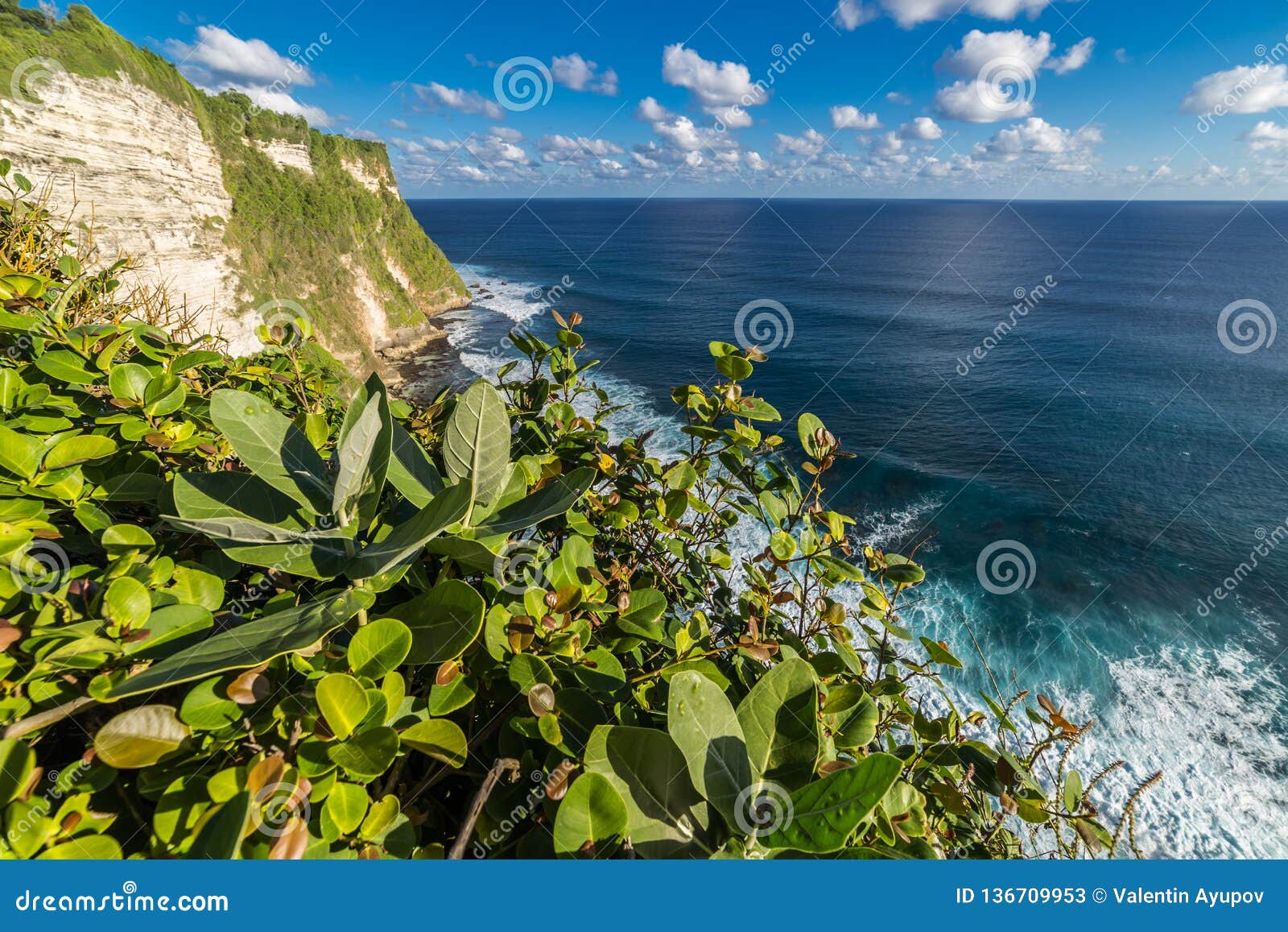 View Of Uluwatu Cliff With Coast And Blue Ocean  In Bali  