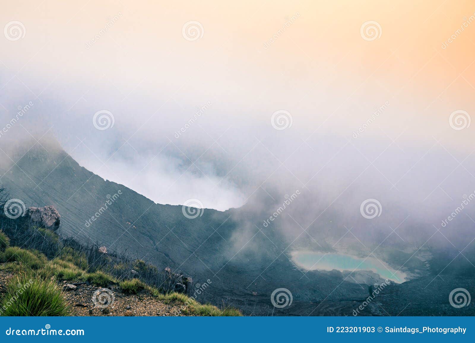 view of the viewpoint of the turrialba volcano national park where you can see the main crater on the left and a turquoise