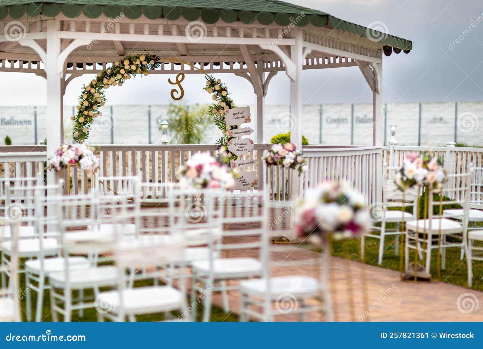 View of a Waterside Decorated Wedding Venue in the Evening Stock Image
