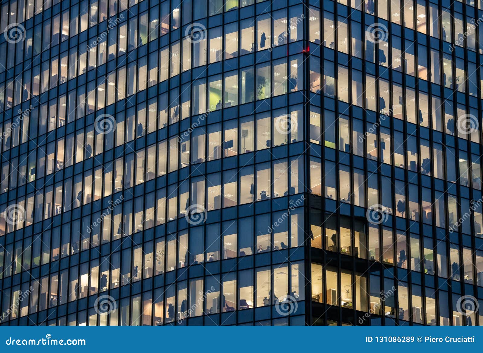 View of Windows with People Working in the Interior of an Office Building  at Night in Milan, Italy Editorial Stock Image - Image of concept, glass:  131086289